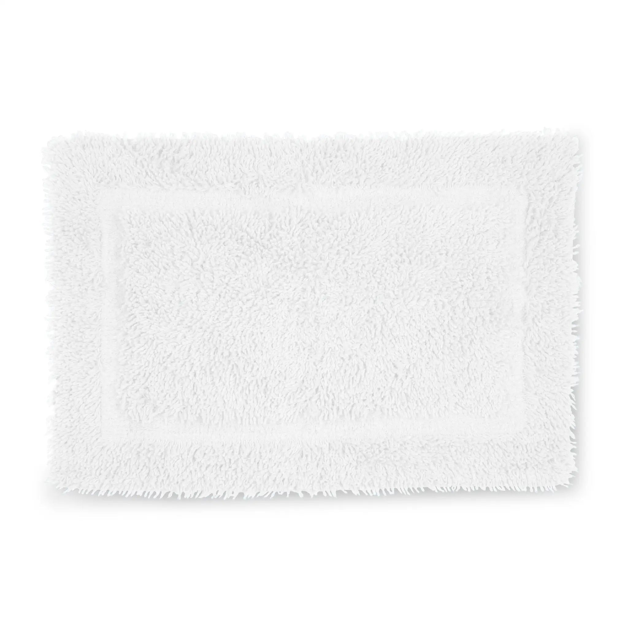 A white rectangular bath rug with a plush, shaggy texture and a raised border, shown against a plain white background.