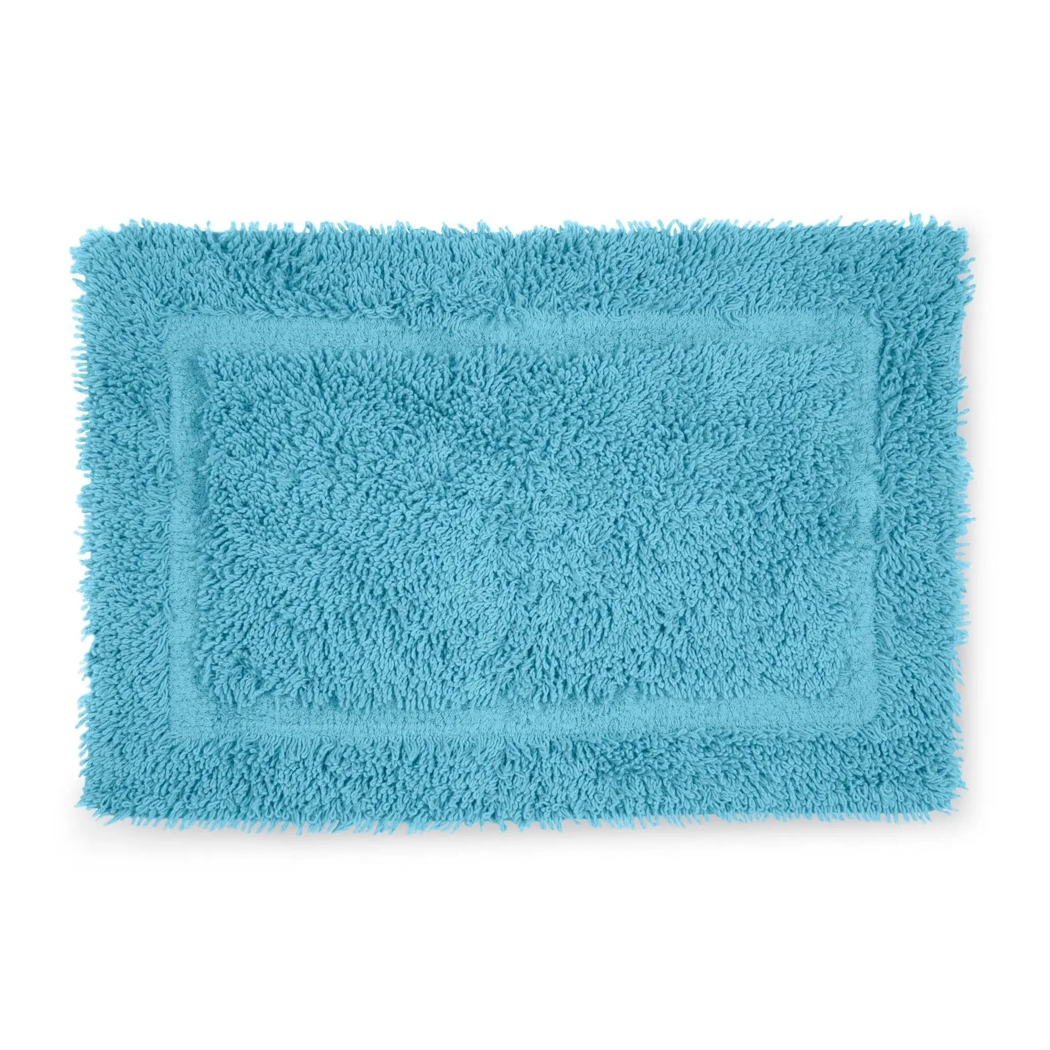Blue bath rug on a white background