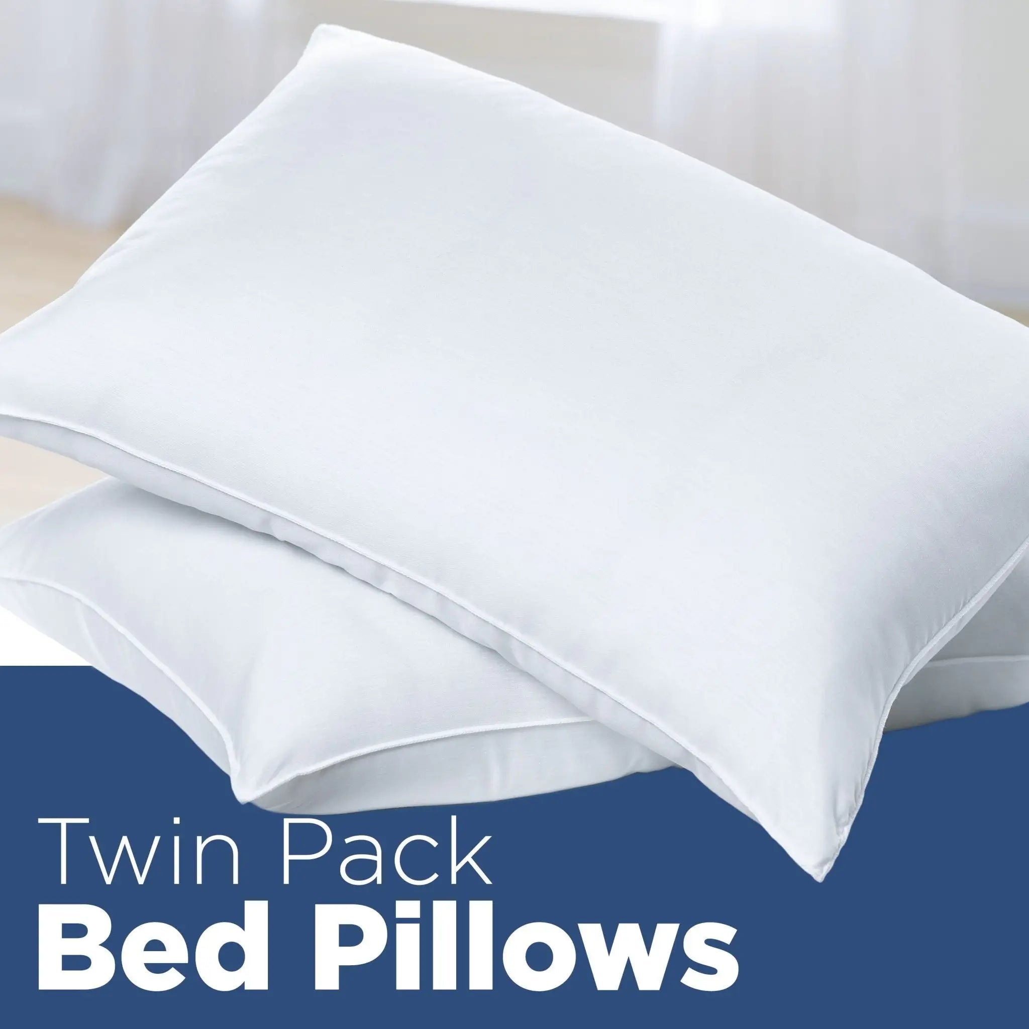 Two white bed pillows stacked on a bed with a blue banner at the bottom reading 'Twin Pack Bed Pillows'.