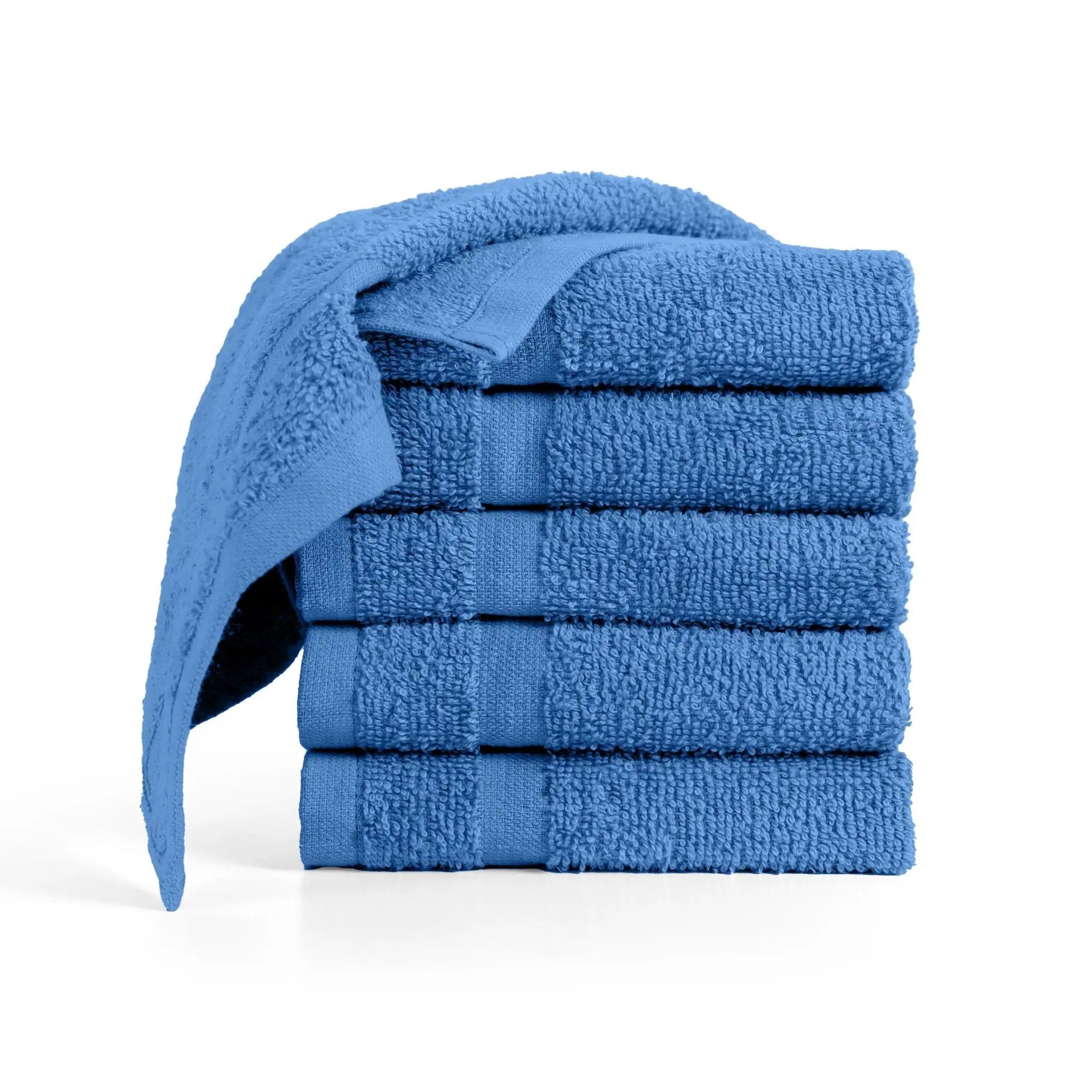Stack of blue washcloths on a white background