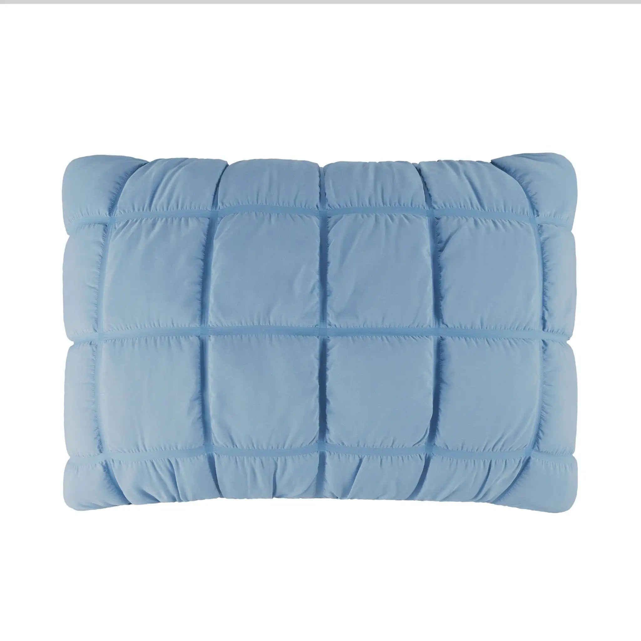 Light blue quilted pillow on a white background