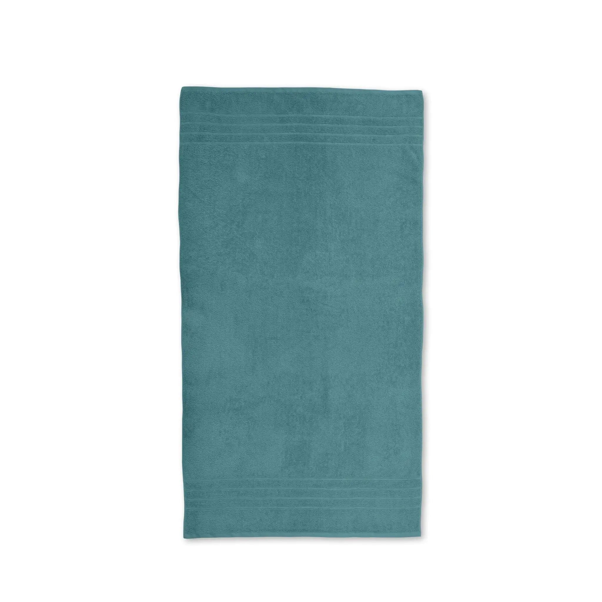 Larkspur Teal towel laid flat on a white background