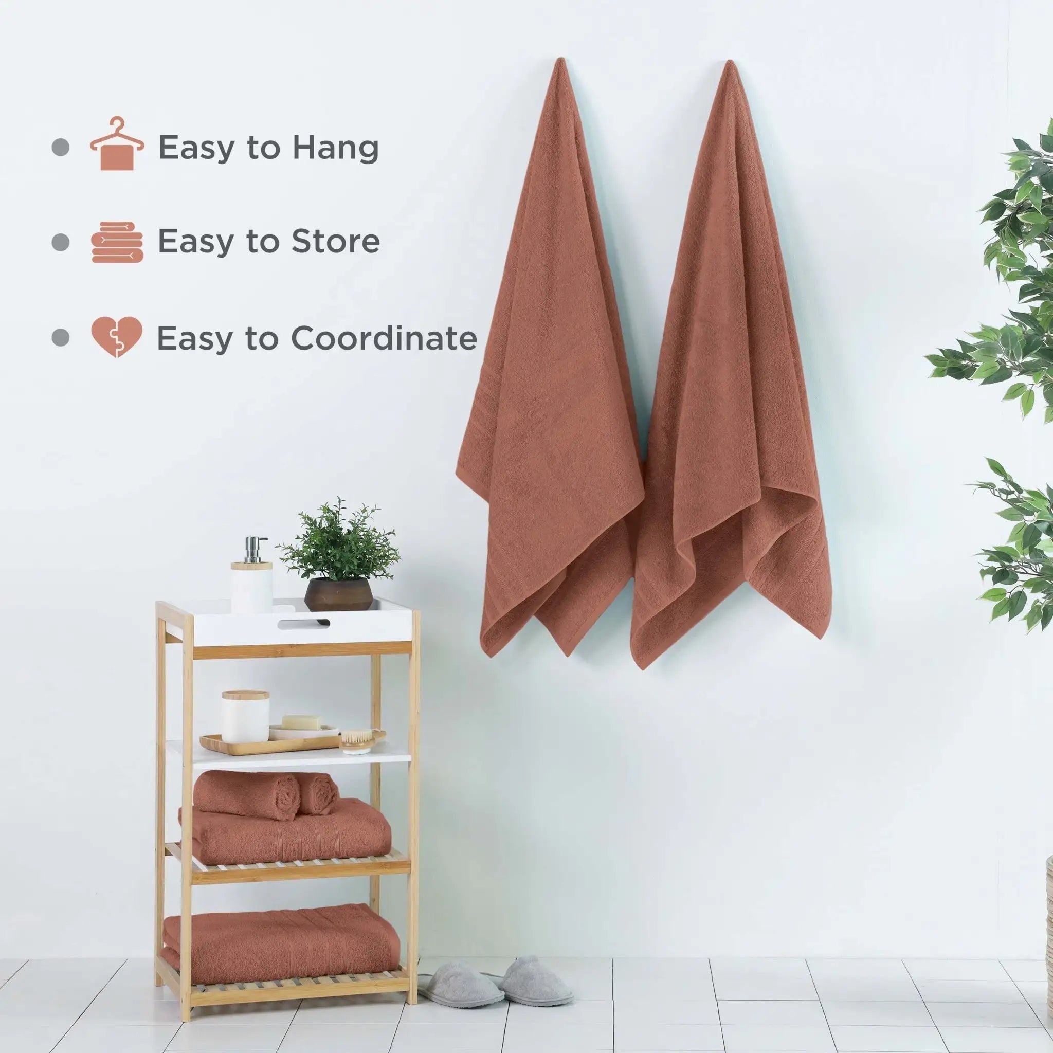 Terracotta colored bath sheets hanging on a rack with text indicating ease of use.