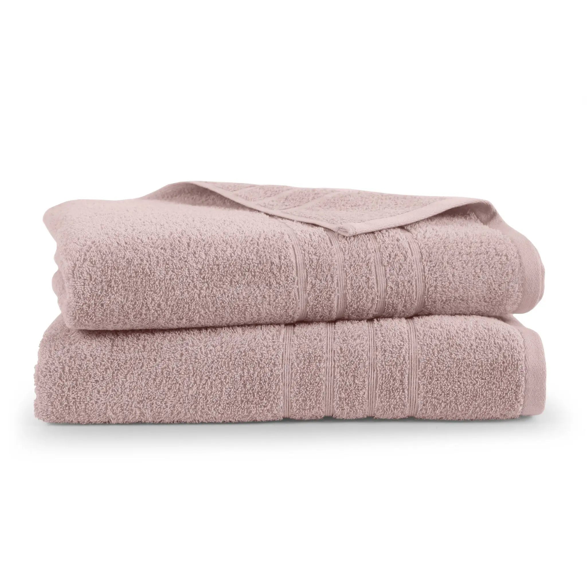 Two folded pink bath sheets on a white background