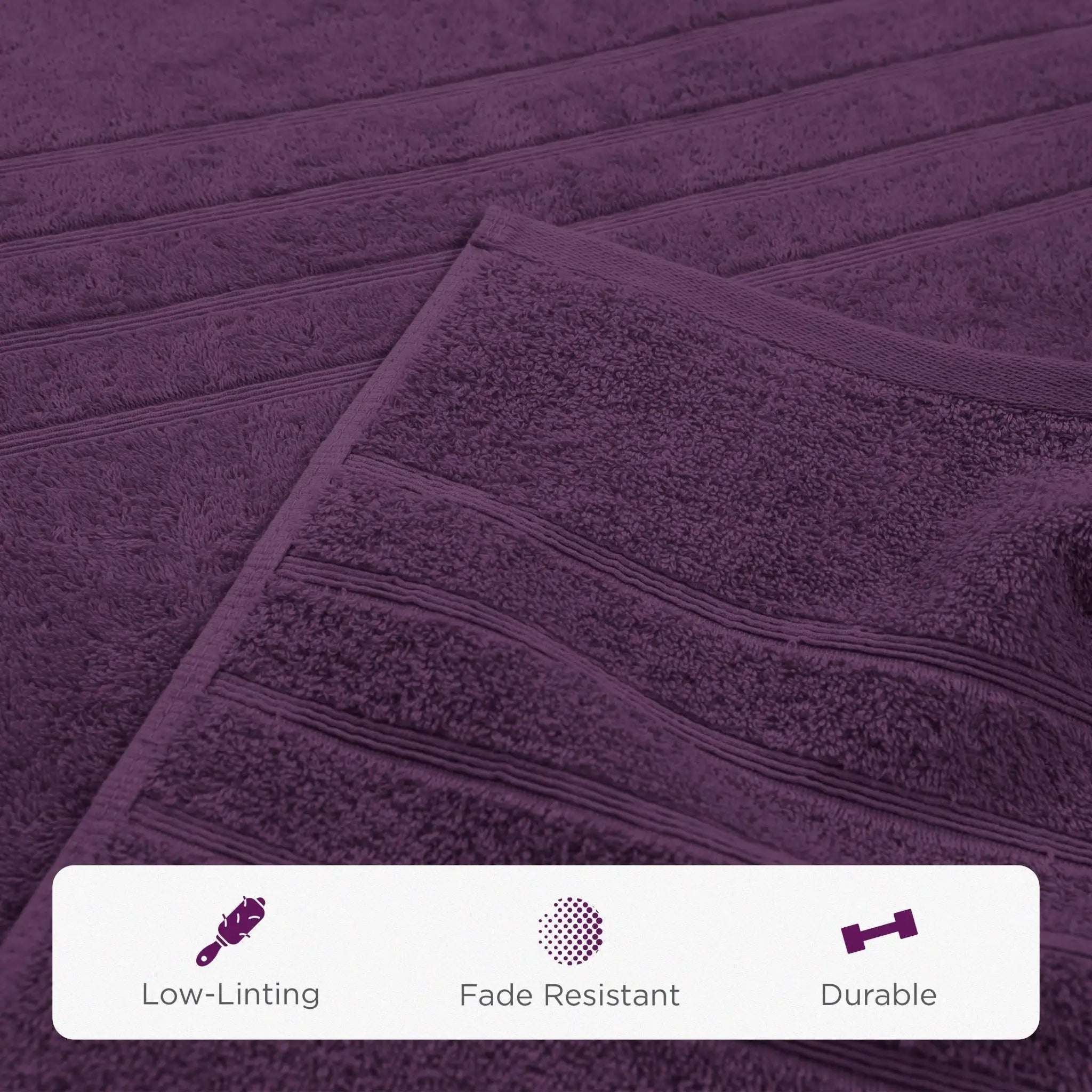 Purple bath sheets with texture details and feature icons at the bottom