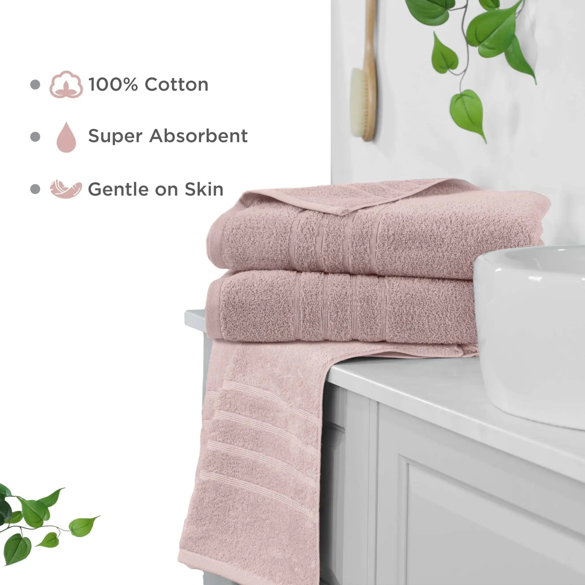 Pink bath sheets on a bathroom counter with text highlighting features.