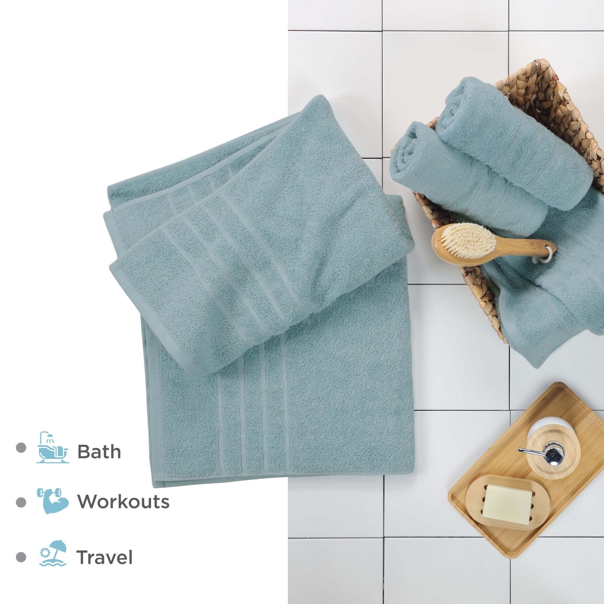 Mineral bath sheets on a tiled floor with bath accessories.
