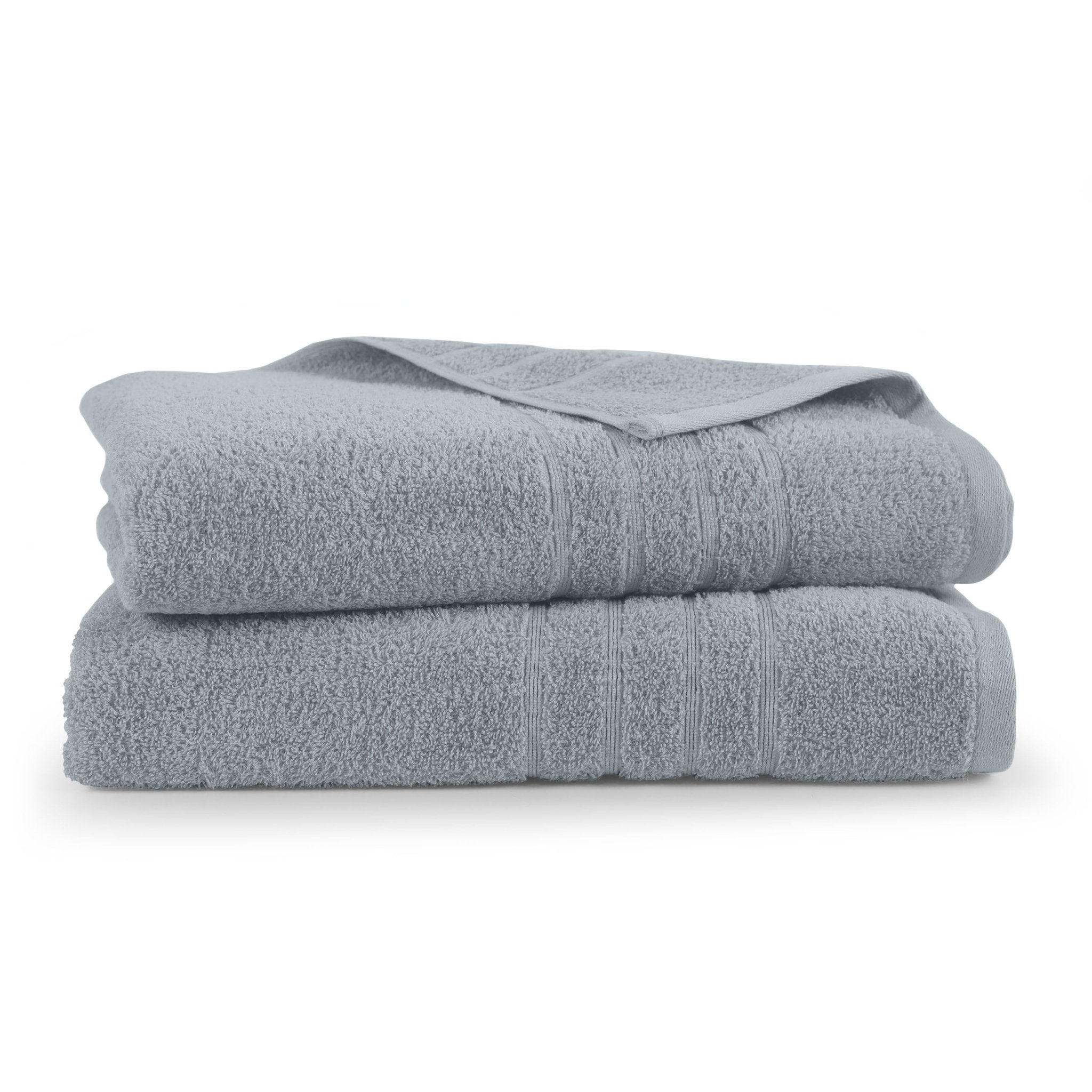 Two folded spa blue bath sheets on a white background