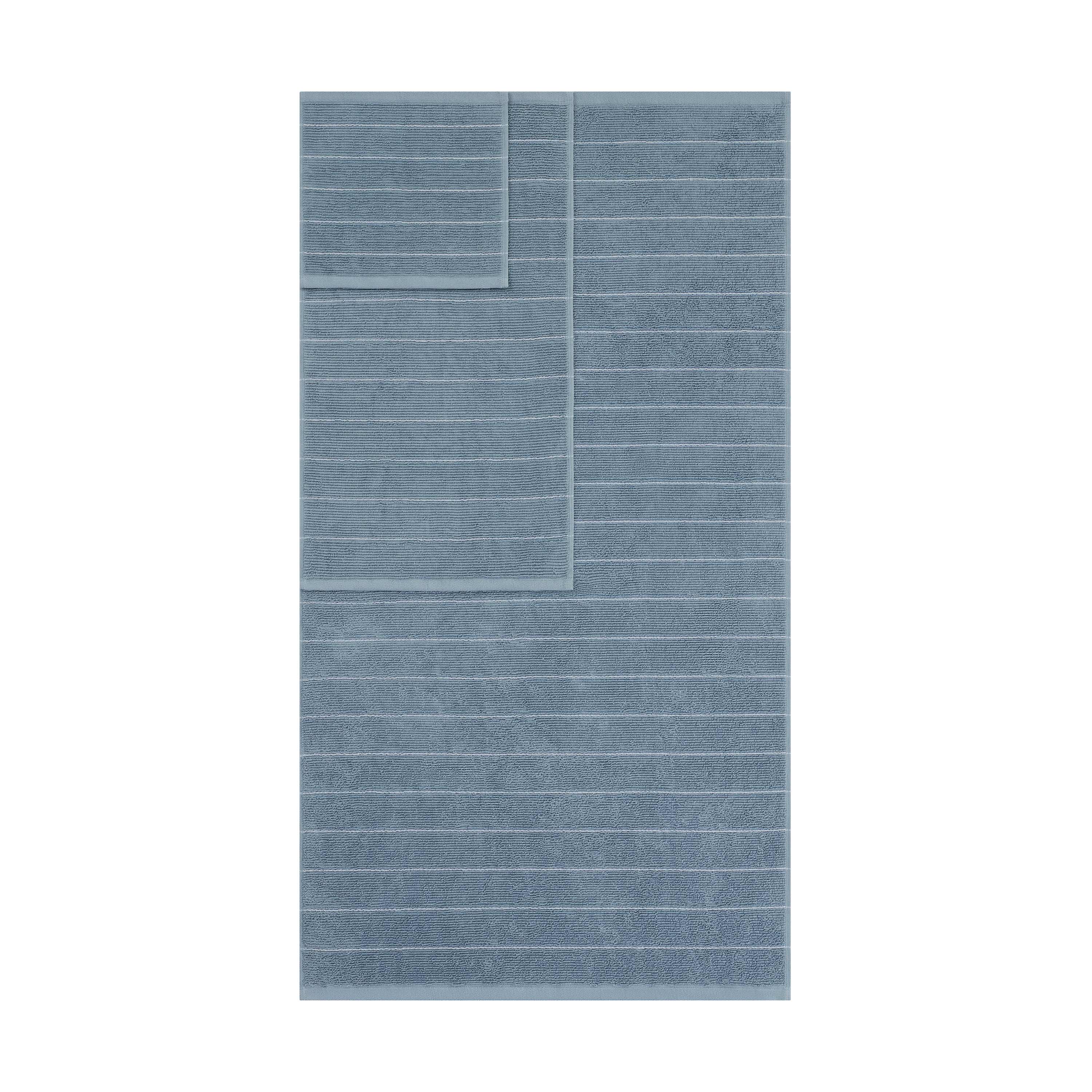 Three towels in a slub stripe pattern, featuring a soft blue color and varying sizes.