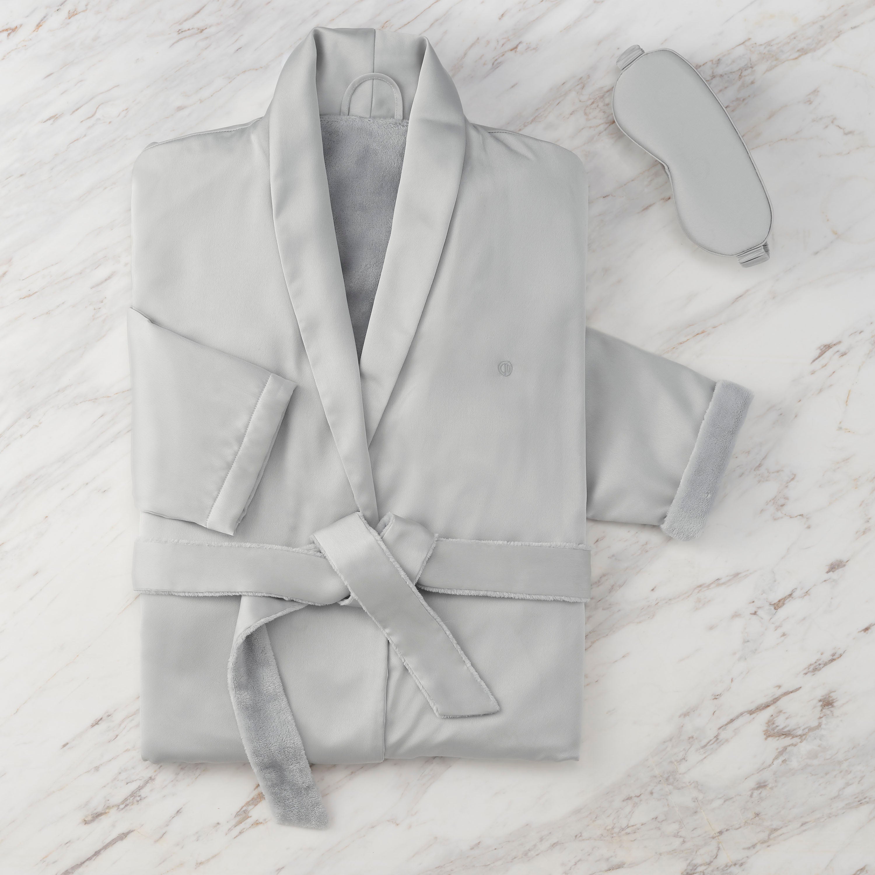 Gray satin robe with a matching eyemask, featuring a soft inner lining and a tied belt.