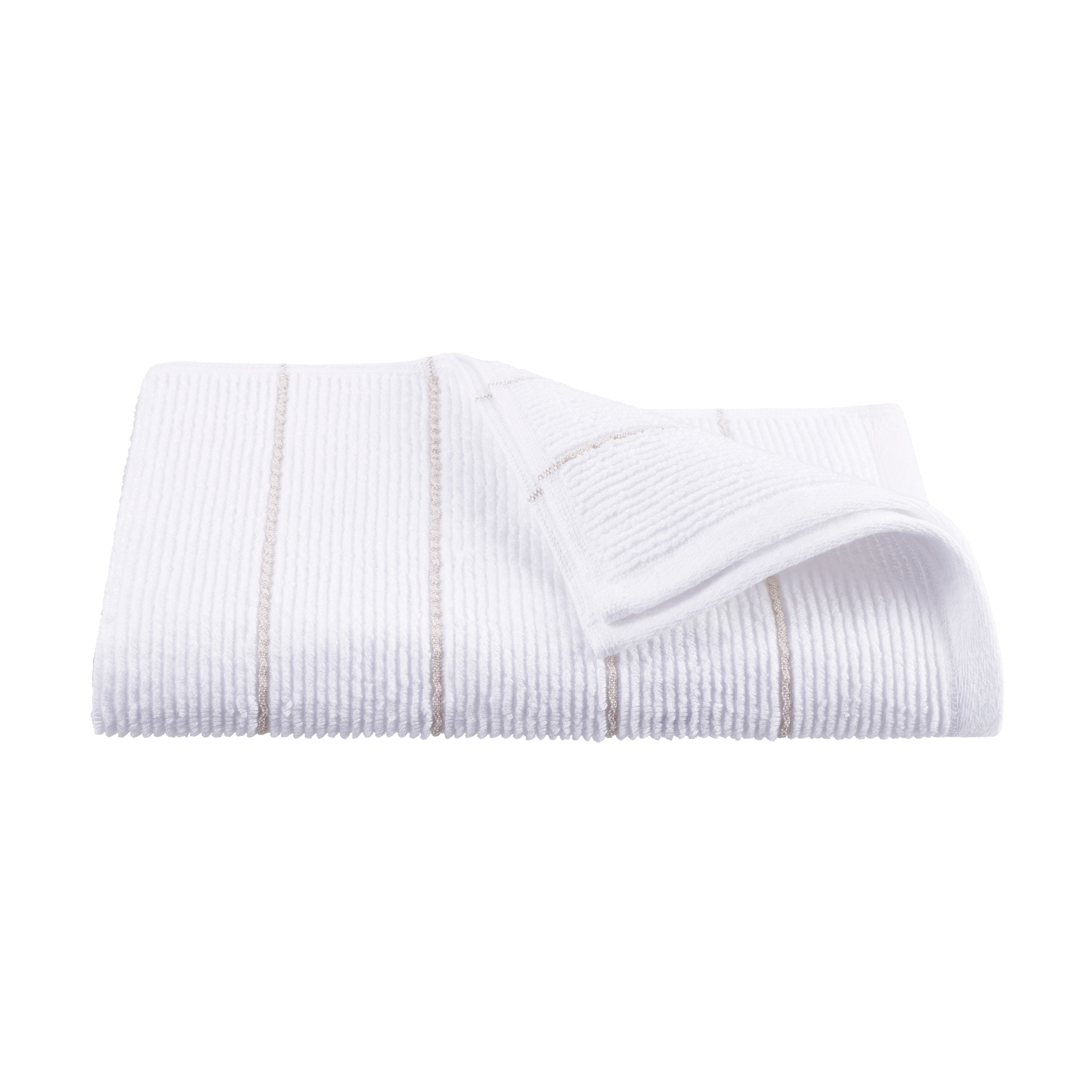 White towel with textured stripes and a folded corner, showcasing a soft, absorbent fabric.