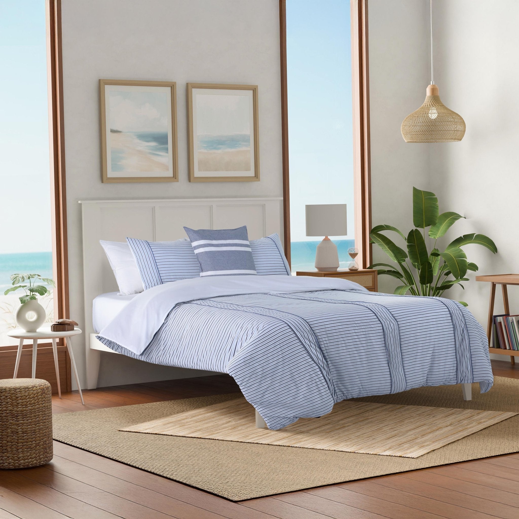 Bedroom with blue striped comforter set.