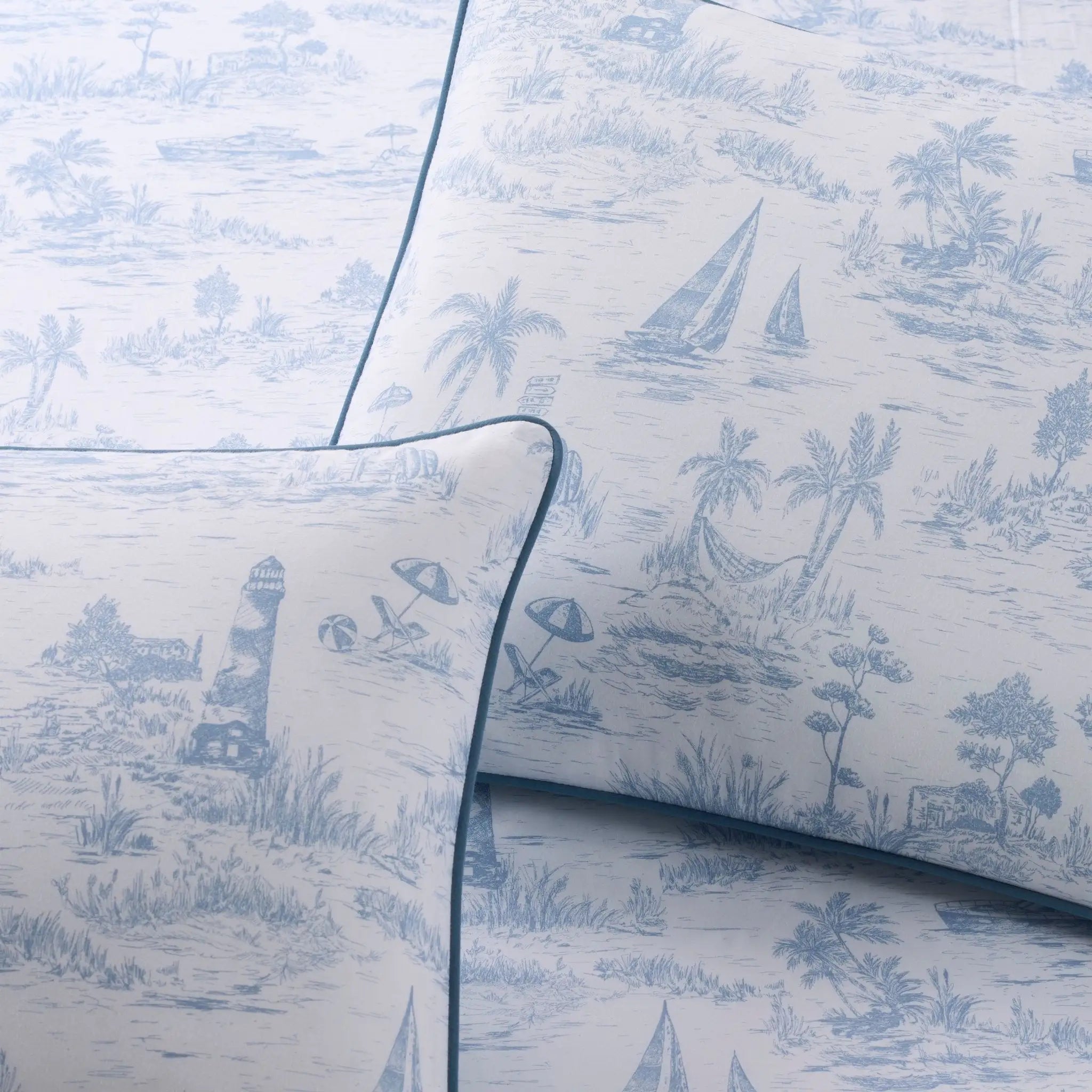 Blue and white toile patterned comforter set.