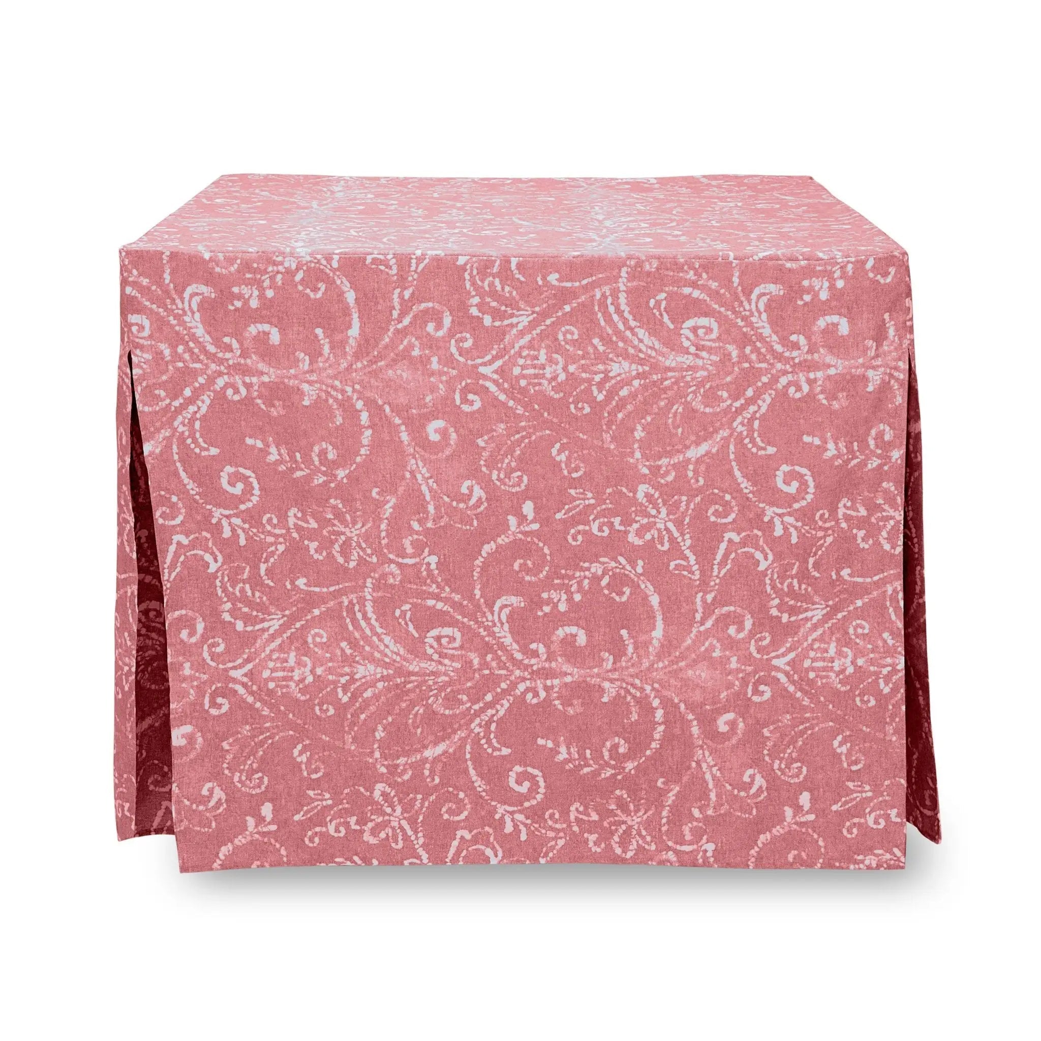 A rectangular tablecloth in dusty rose pink with a white damask scroll pattern, shown from a top-down angle on a white background.