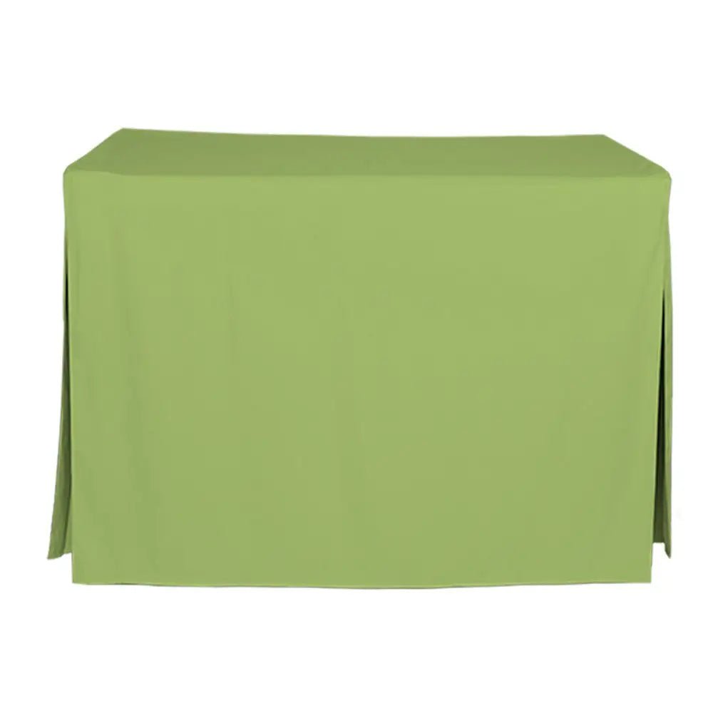 A light green tablecloth draped over a rectangular table, shown against a plain white background.