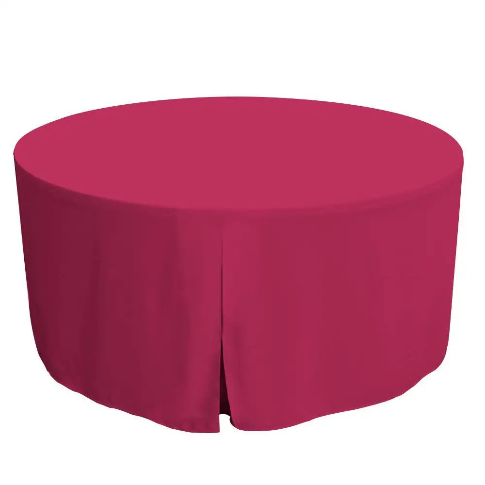 A round table covered with a solid pink tablecloth, shown against a plain white background.