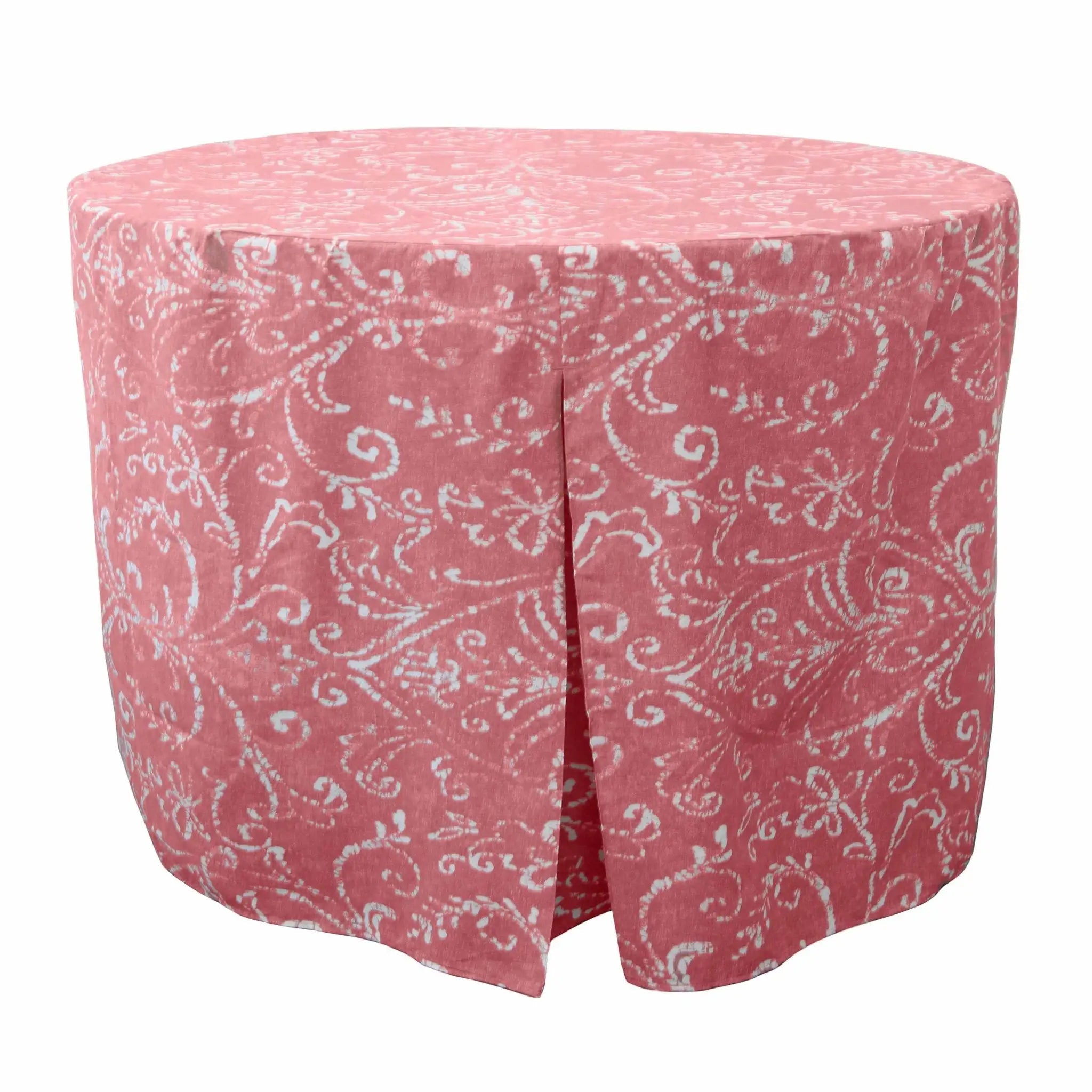Washed red table cover with white paisley pattern on a white background