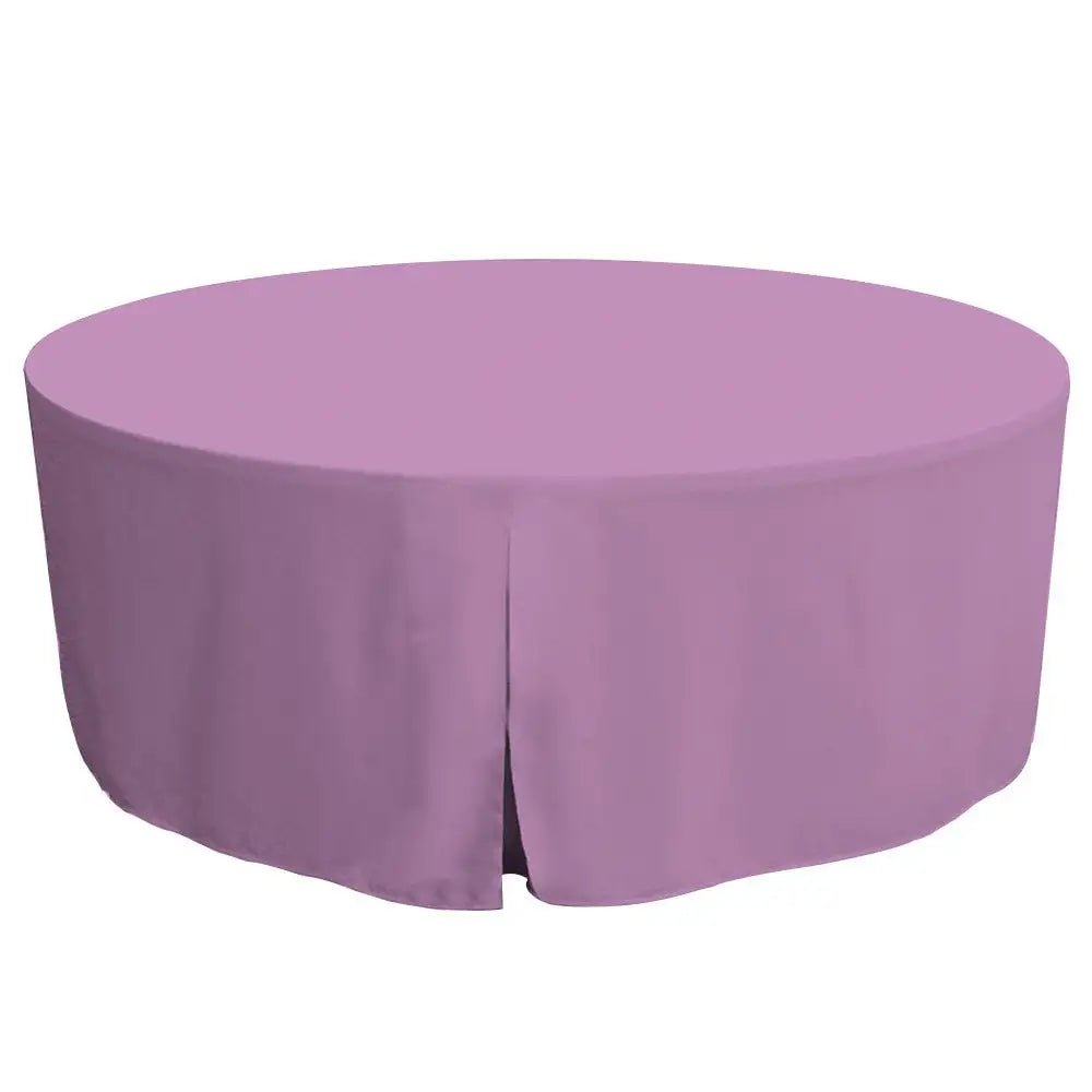 Round table covered with a lilac table cover on a white background