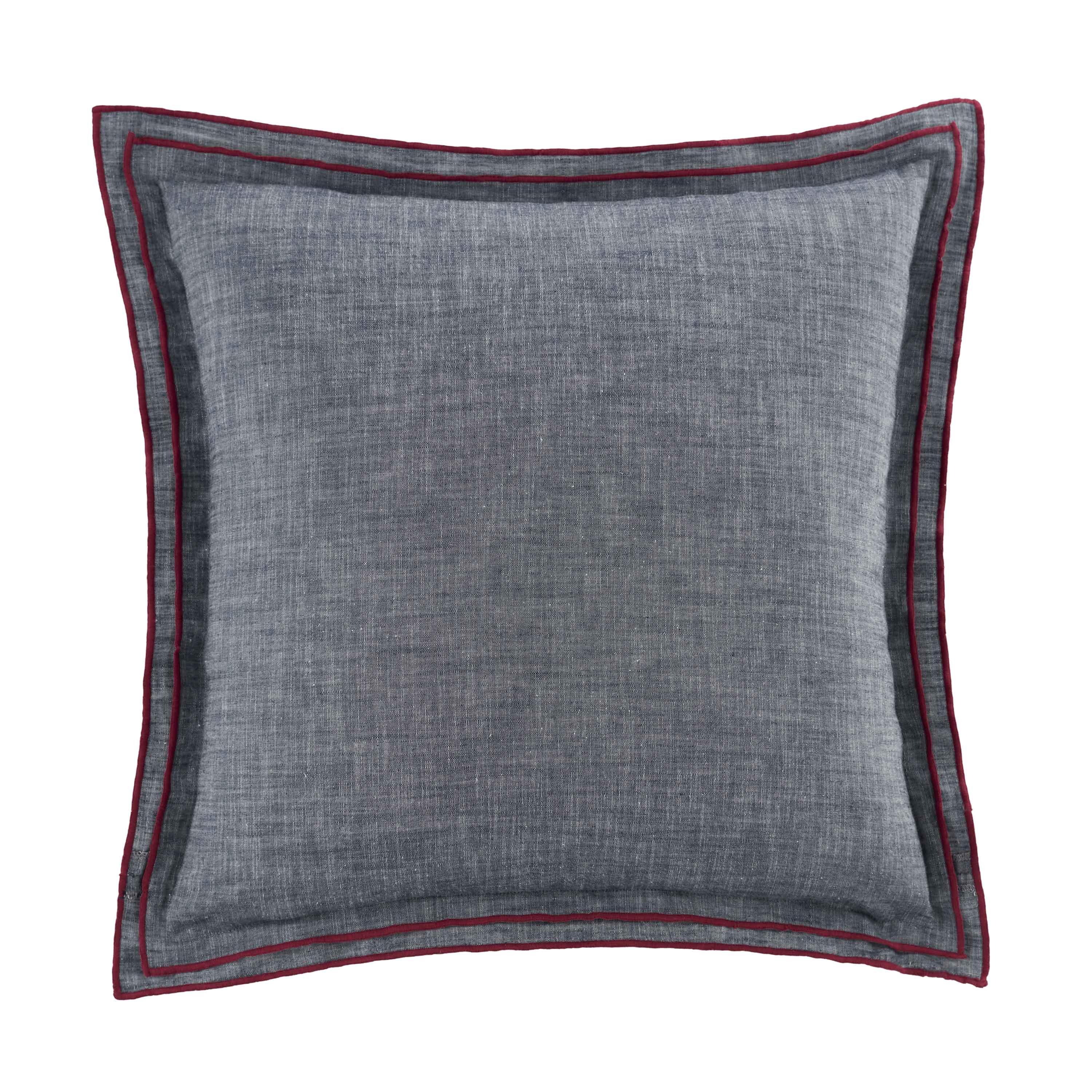 Square navy decorative pillow with a textured surface and contrasting red trim.