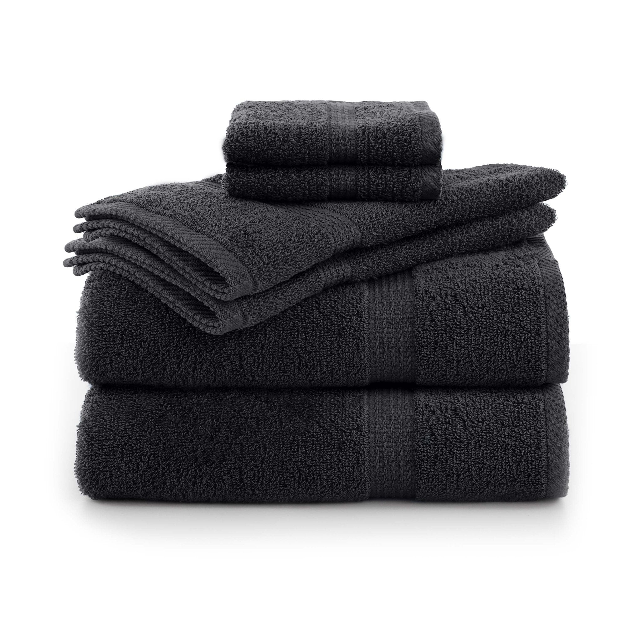 Set of black towels stacked on a white background