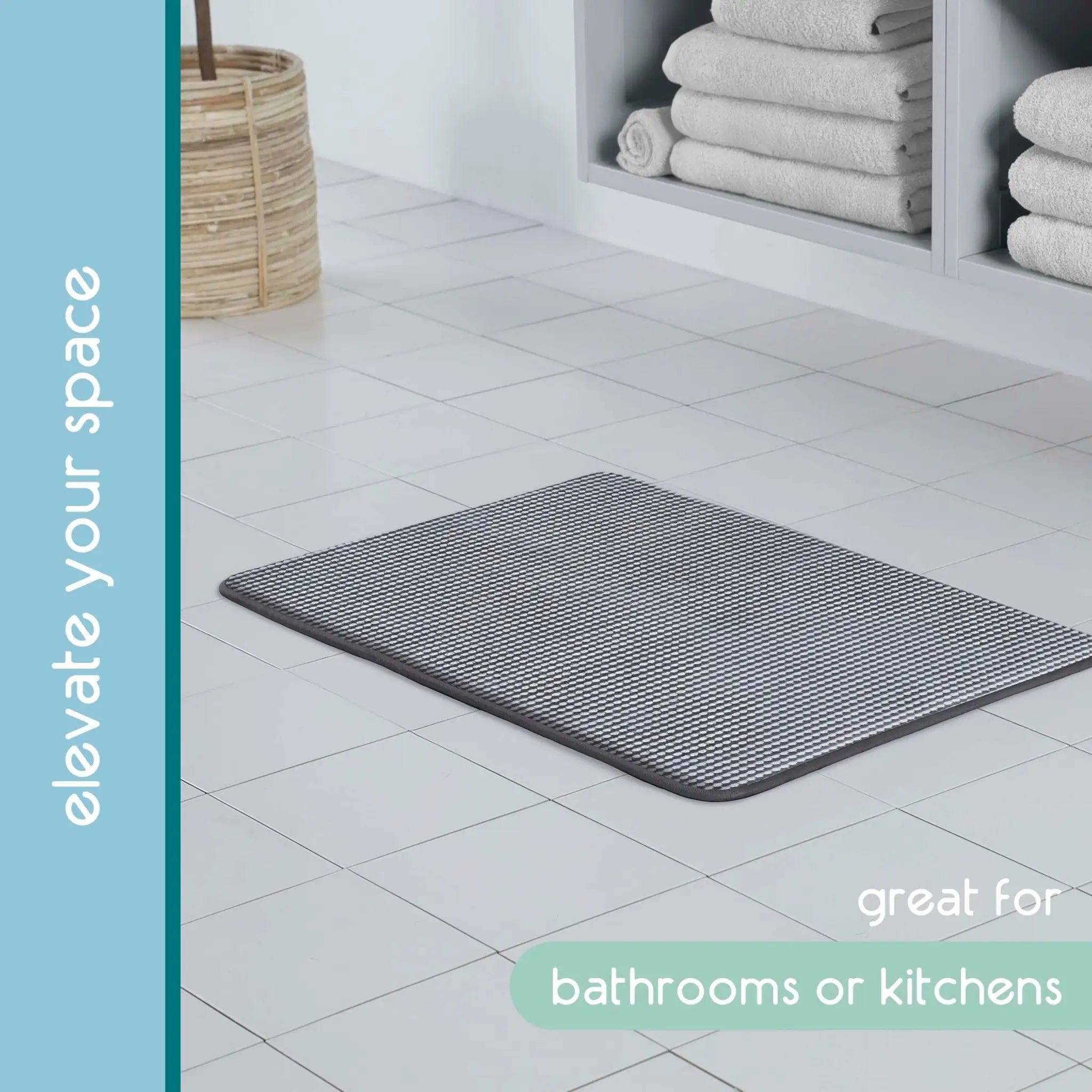 A rectangular black bath rug with a textured striped pattern, shown on a light gray tiled bathroom floor.