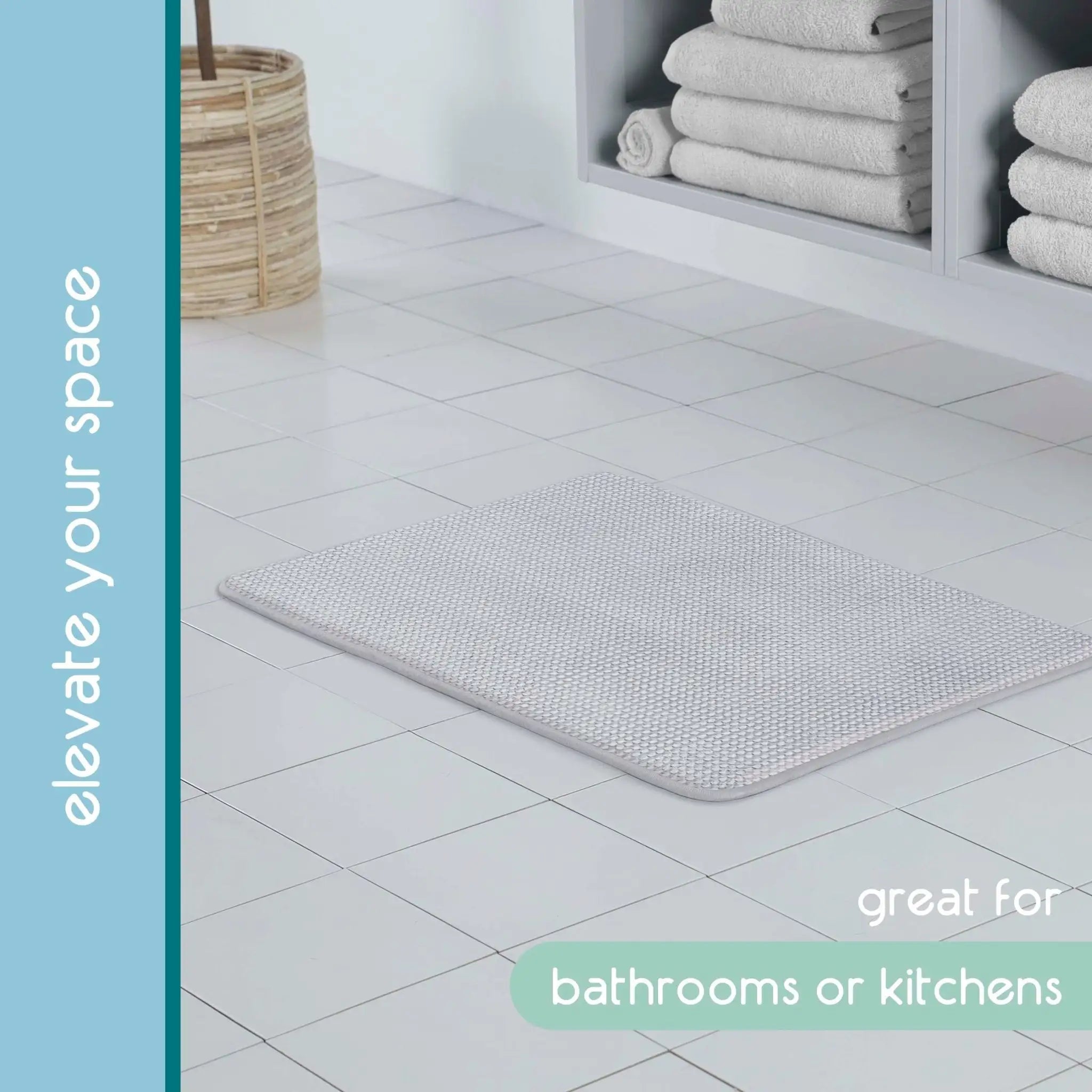 A textured light grey bath rug shown on a light tiled floor in a bathroom setting, with folded towels on a shelf in the background and text overlays.