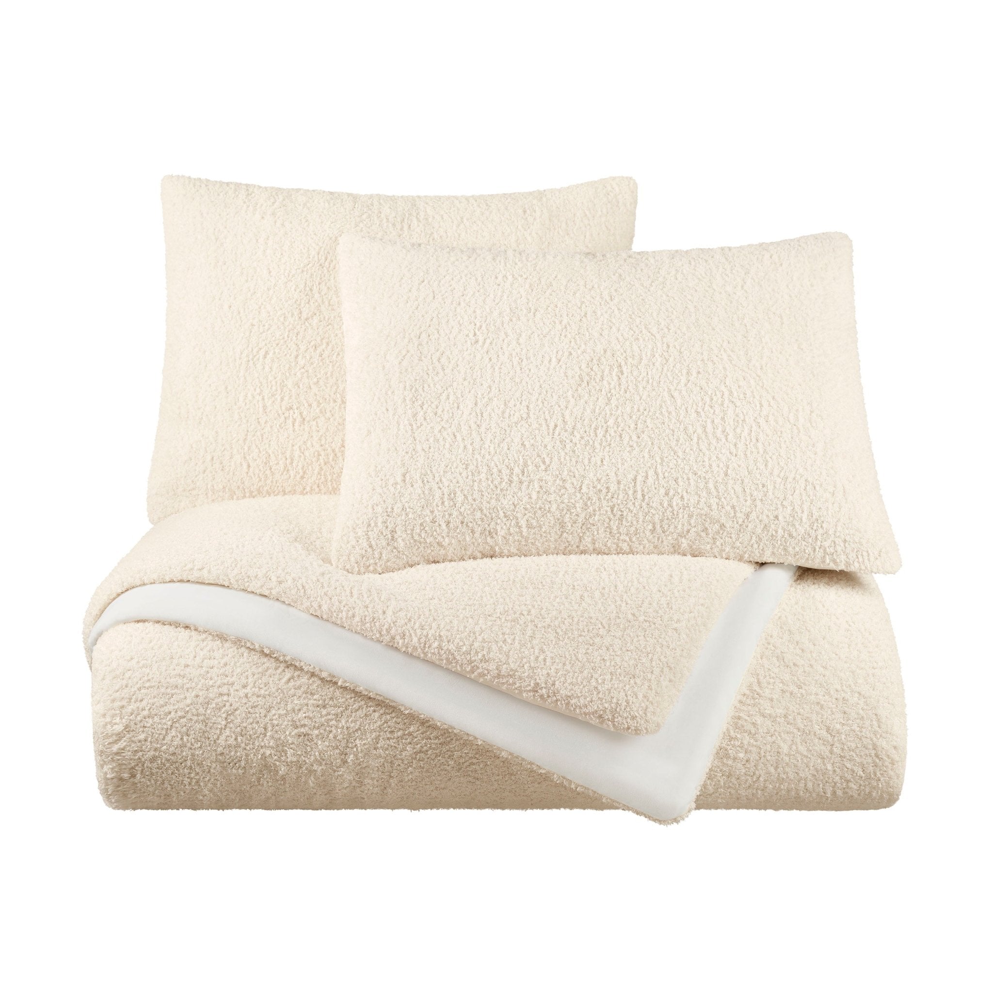 Beige sherpa comforter set on a white background