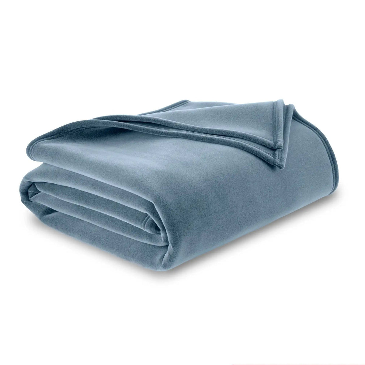 A folded blue fleece blanket on a white background.