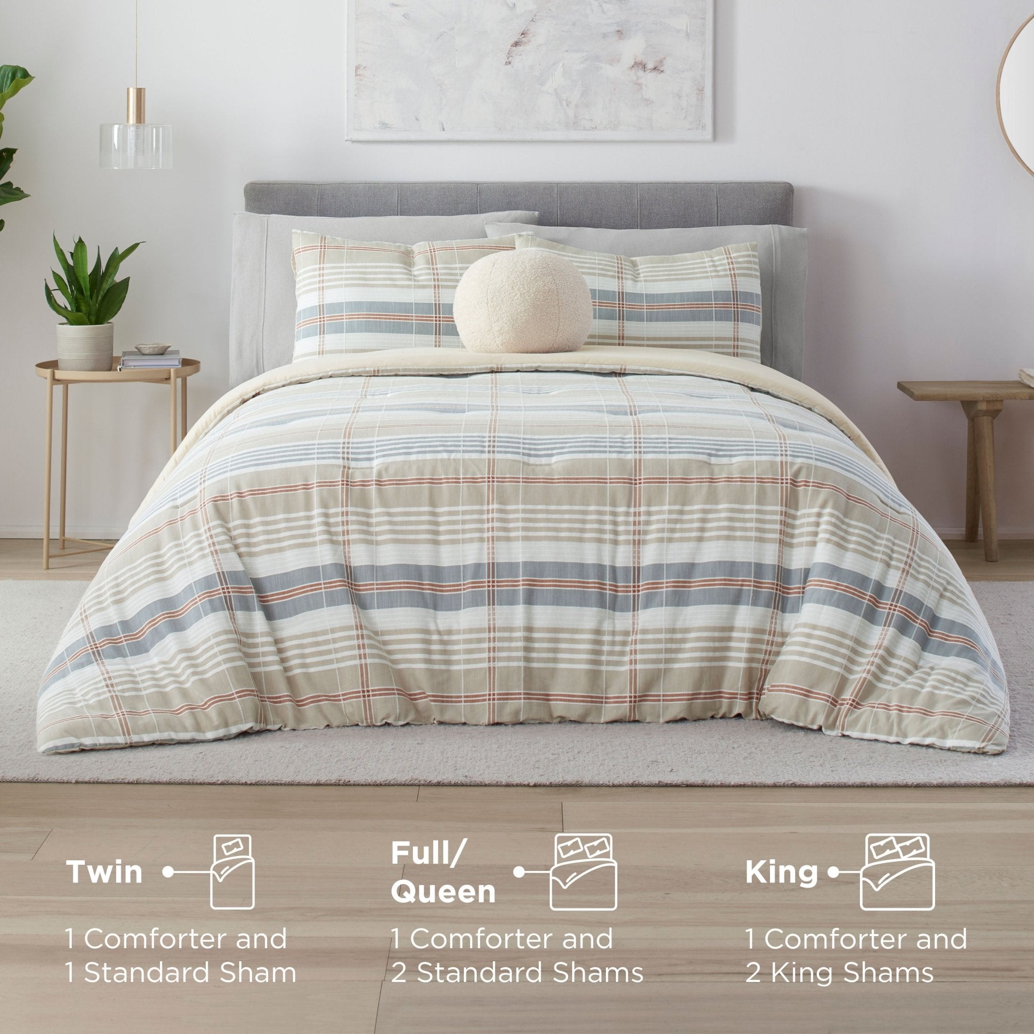 Comforter set with plaid pattern on a bed including the product components in different sizes.