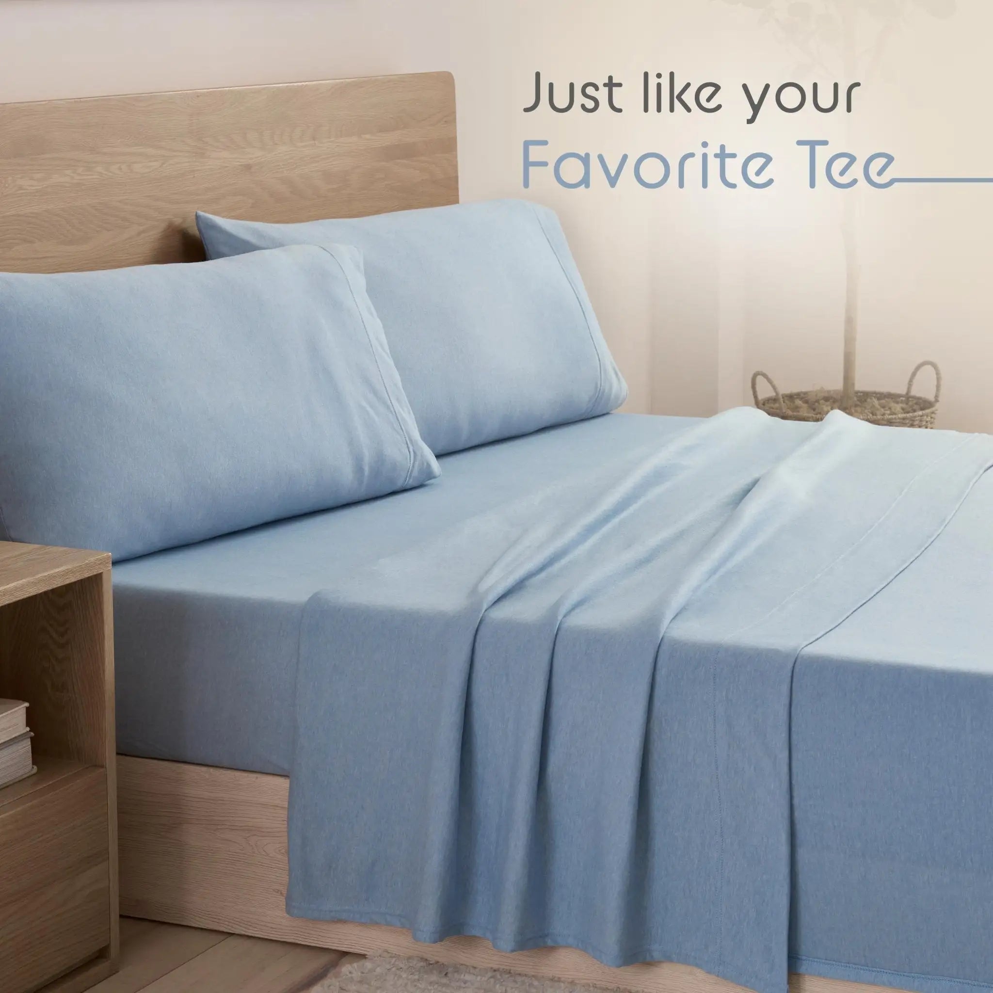 Blue bed sheets on a bed with pillows.