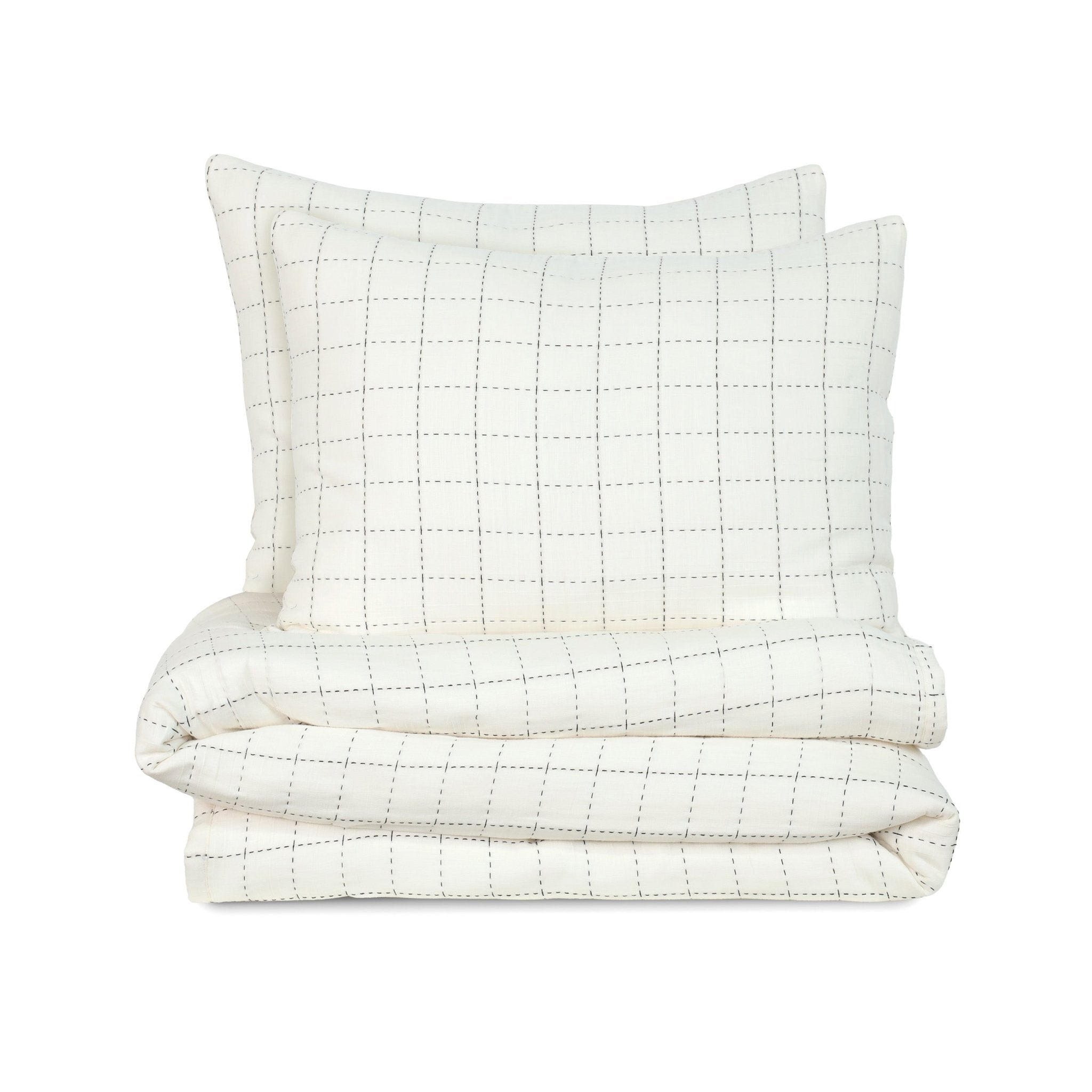 Ivory quilted coverlet set on a white background