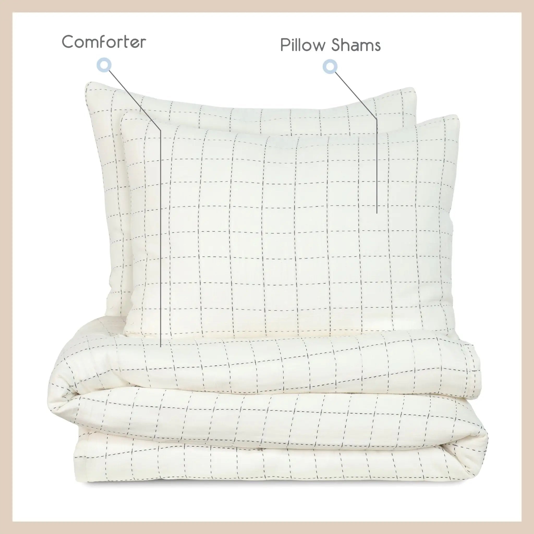 An ivory quilted comforter and matching pillow shams with a subtle dotted grid pattern, shown on a white background with beige border. Text labels point to the comforter as 'Comforter' and the pillow shams as 'Pillow Shams'.