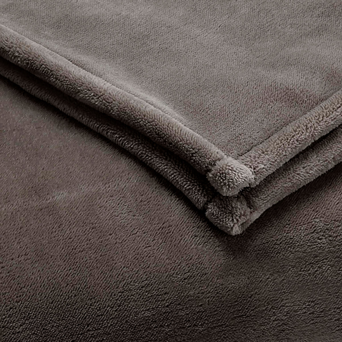 Gray sheared faux mink blanket folded with soft texture and rounded edges.