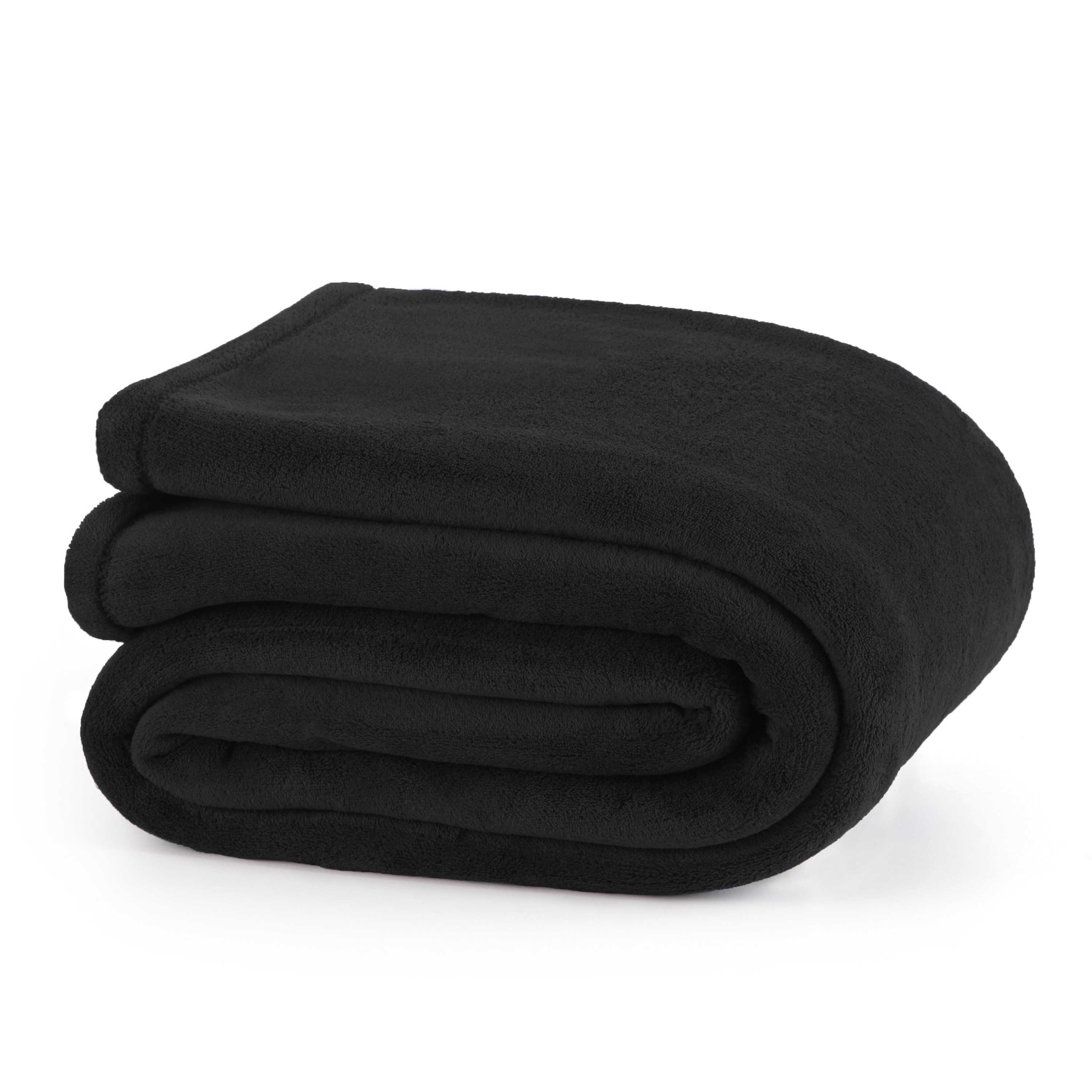 Black plush blanket folded neatly with a soft texture.