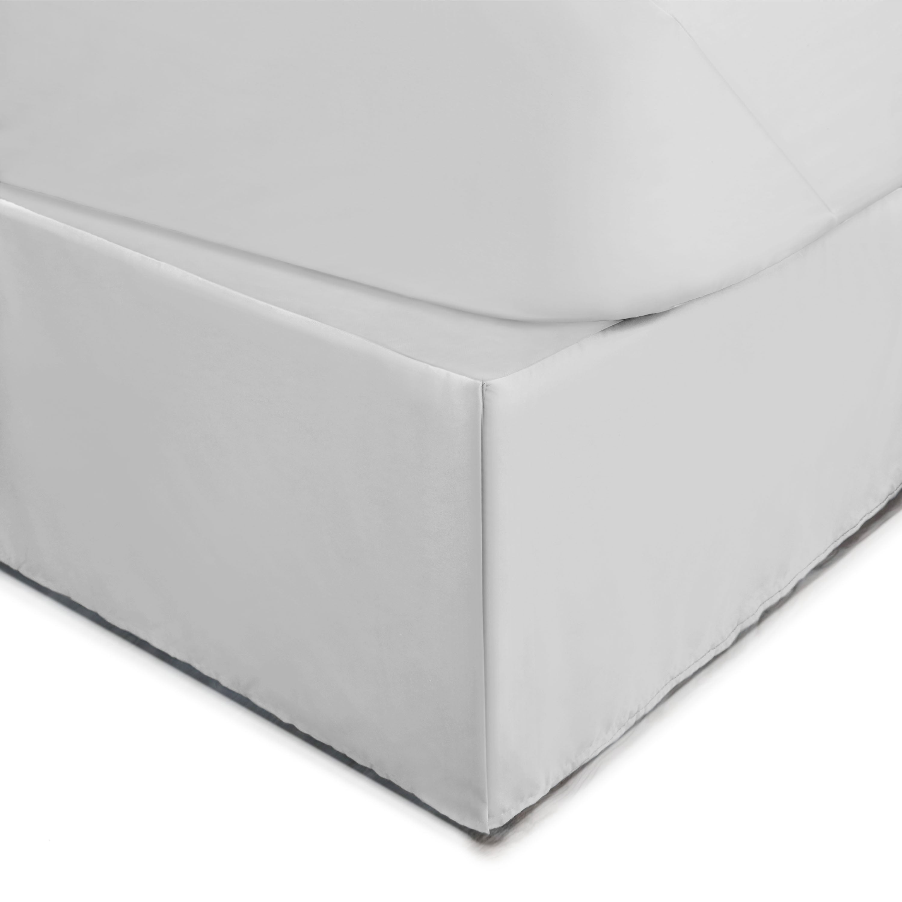 White bed skirt with a 21-inch drop, covering the box spring and bed frame.