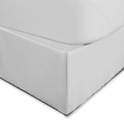White bed skirt with a 21-inch drop, covering the box spring and bed frame.