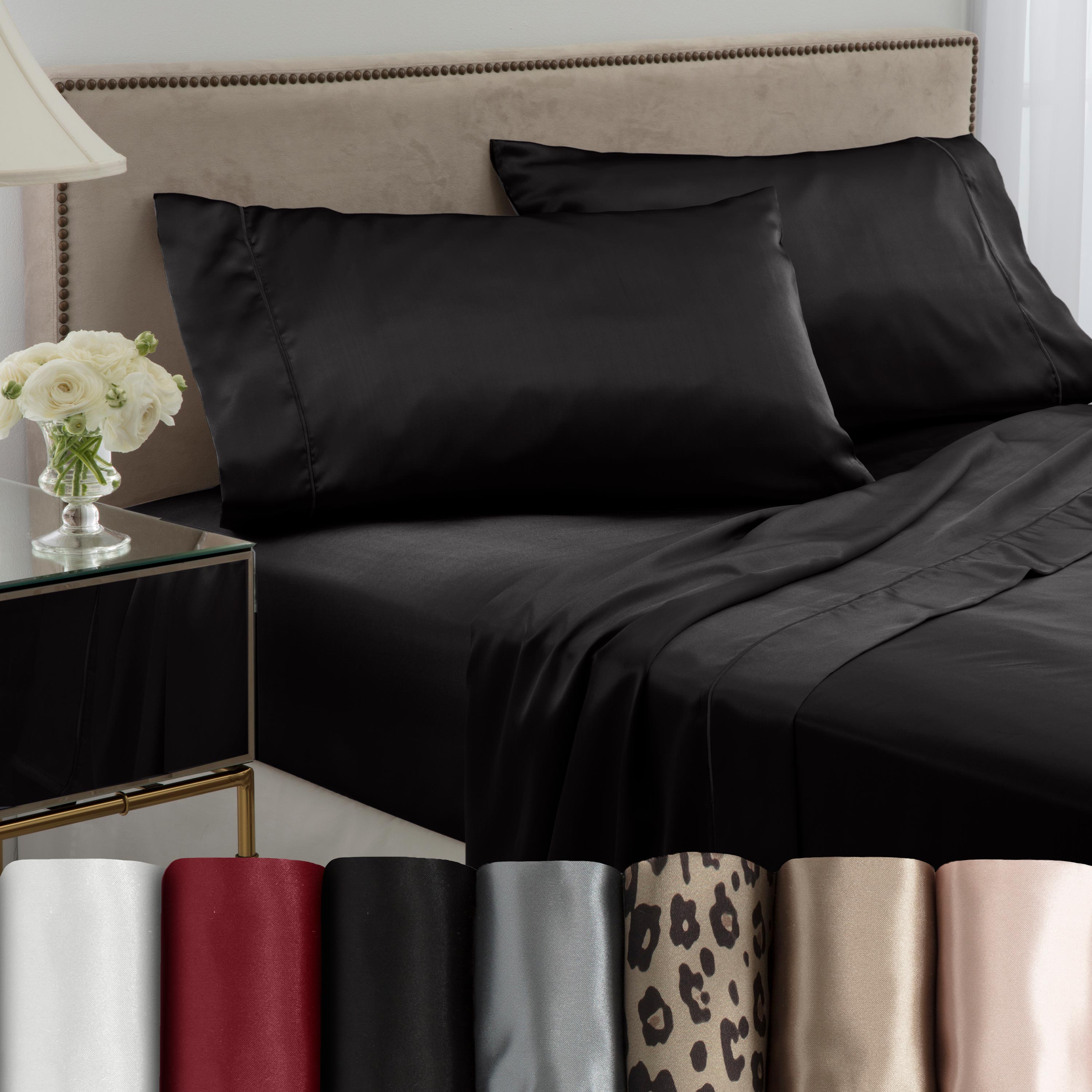 Black satin sheet set displayed on a bed with matching pillows, alongside various color options at the bottom.
