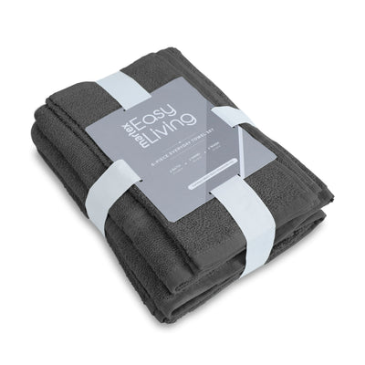 Gray towel set wrapped with a white ribbon, featuring a label indicating it includes six pieces.