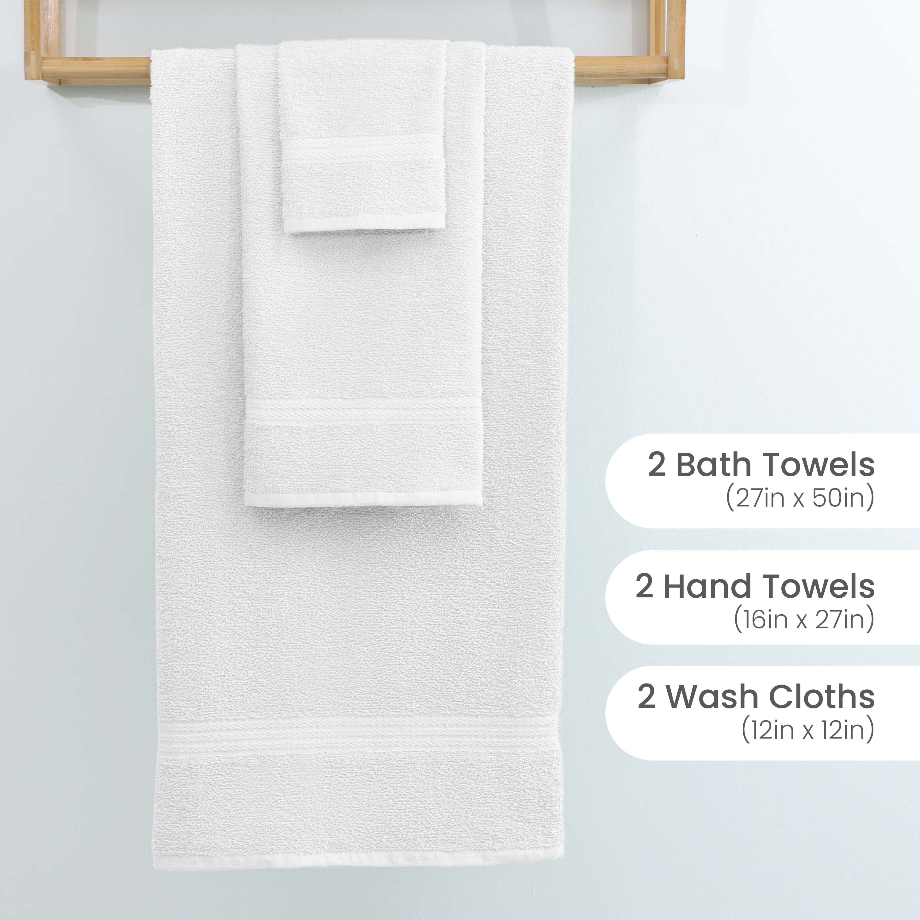 White towel set displayed on a wooden rack, including two bath towels, two hand towels, and two washcloths.