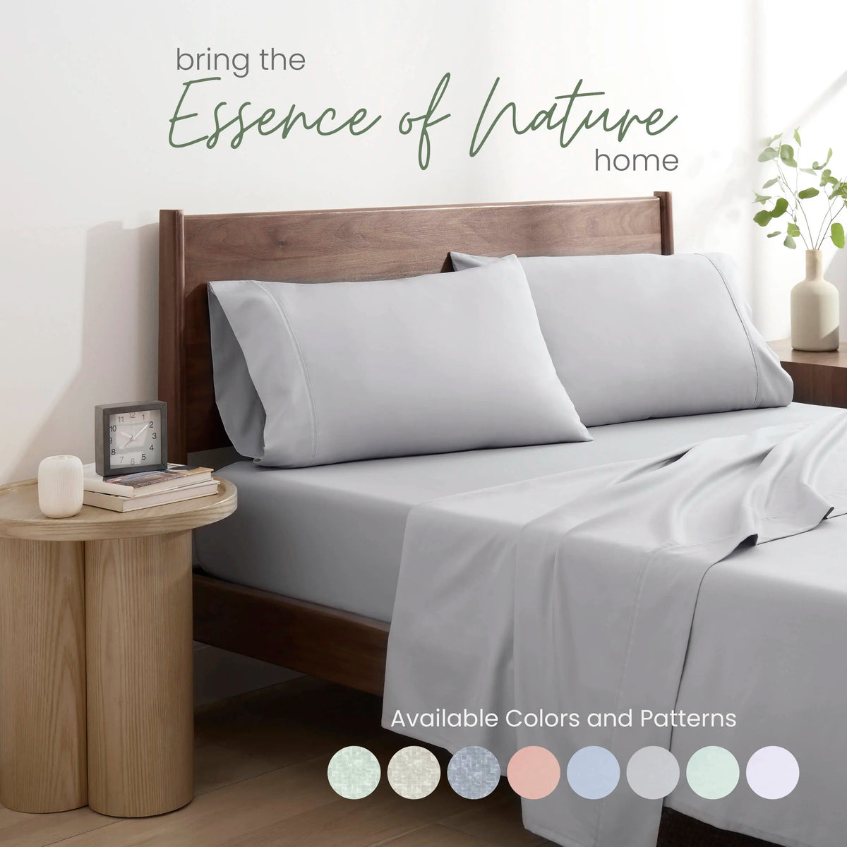 Gray bedding set on a bed with color swatches.