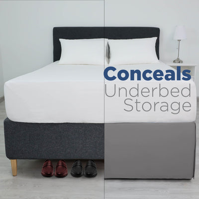 Bed with a white mattress and pillows, featuring a gray bed skirt that covers underbed storage and shoes.