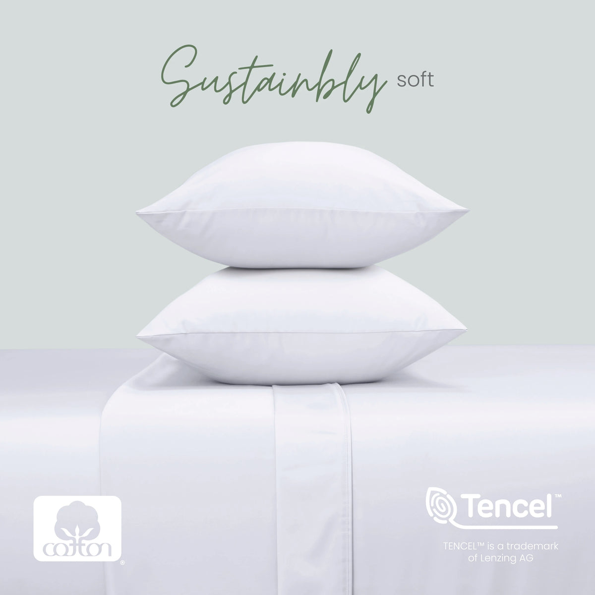 Two white pillows stacked on a matching upholstered surface, with the words 'Sustainably soft' above. Cotton and Tencel logos appear at the bottom, with a pale gray background.