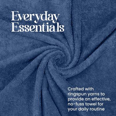 Soft blue towel with a textured surface, arranged in a spiral pattern.