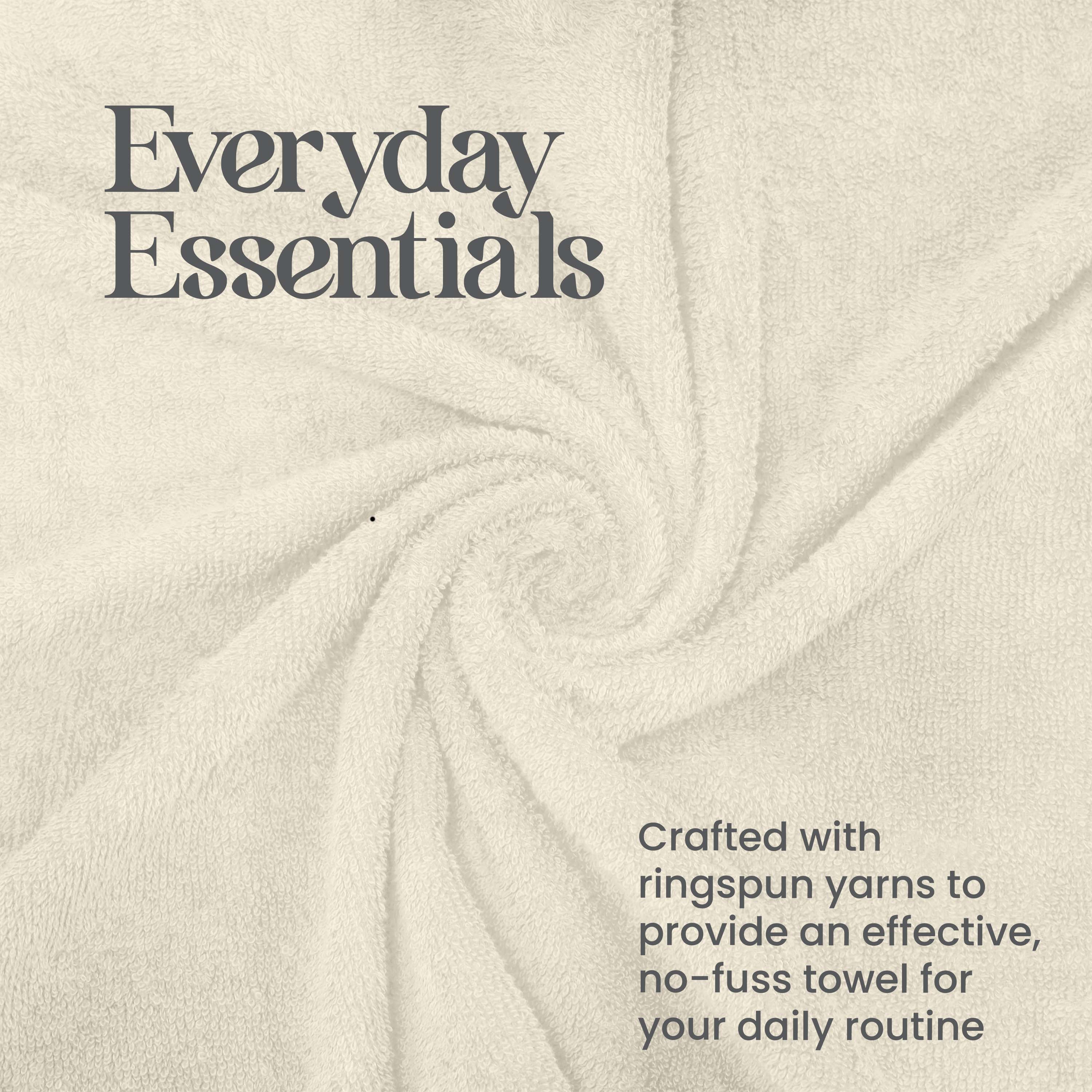 Soft, textured towel in a spiral arrangement, showcasing a neutral color and plush fabric.