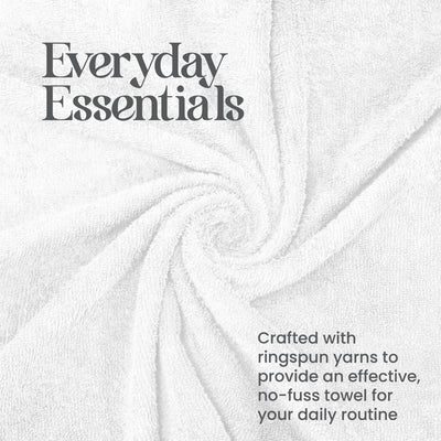 White towel with a textured surface, arranged in a spiral pattern.