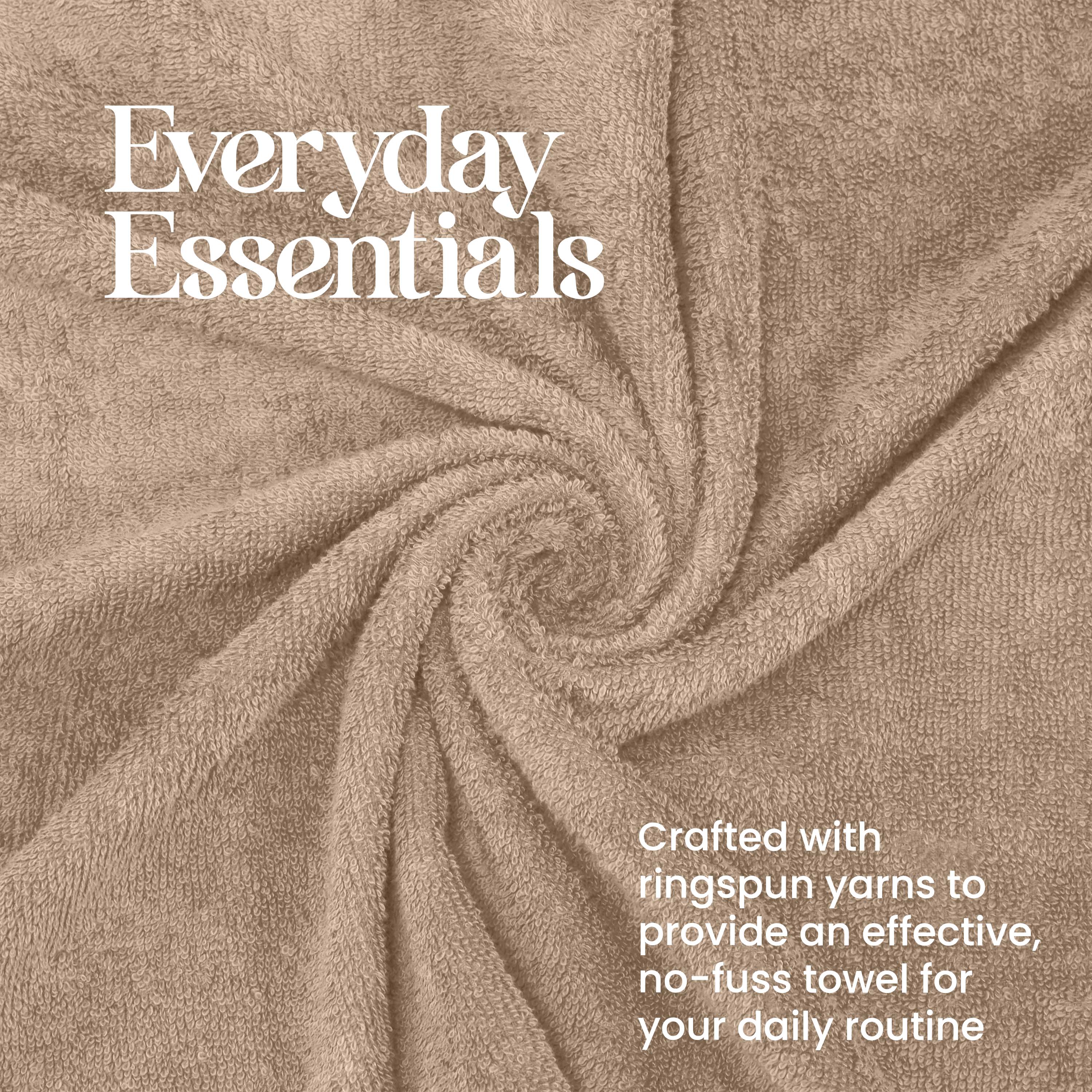 Beige towel arranged in a spiral pattern, showcasing its soft texture and absorbent fabric.