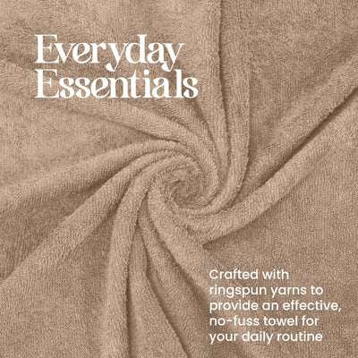 Beige towel arranged in a spiral pattern, showcasing its soft texture and absorbent fabric.