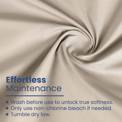 Beige cotton fabric with a smooth texture, featuring care instructions in blue text.