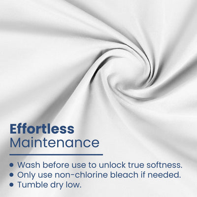 White cotton fabric with care instructions for maintenance, including washing and drying guidelines.