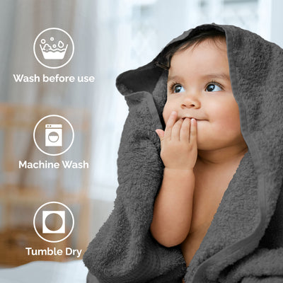 A child wrapped in a gray towel looks up thoughtfully, with care instructions displayed nearby.